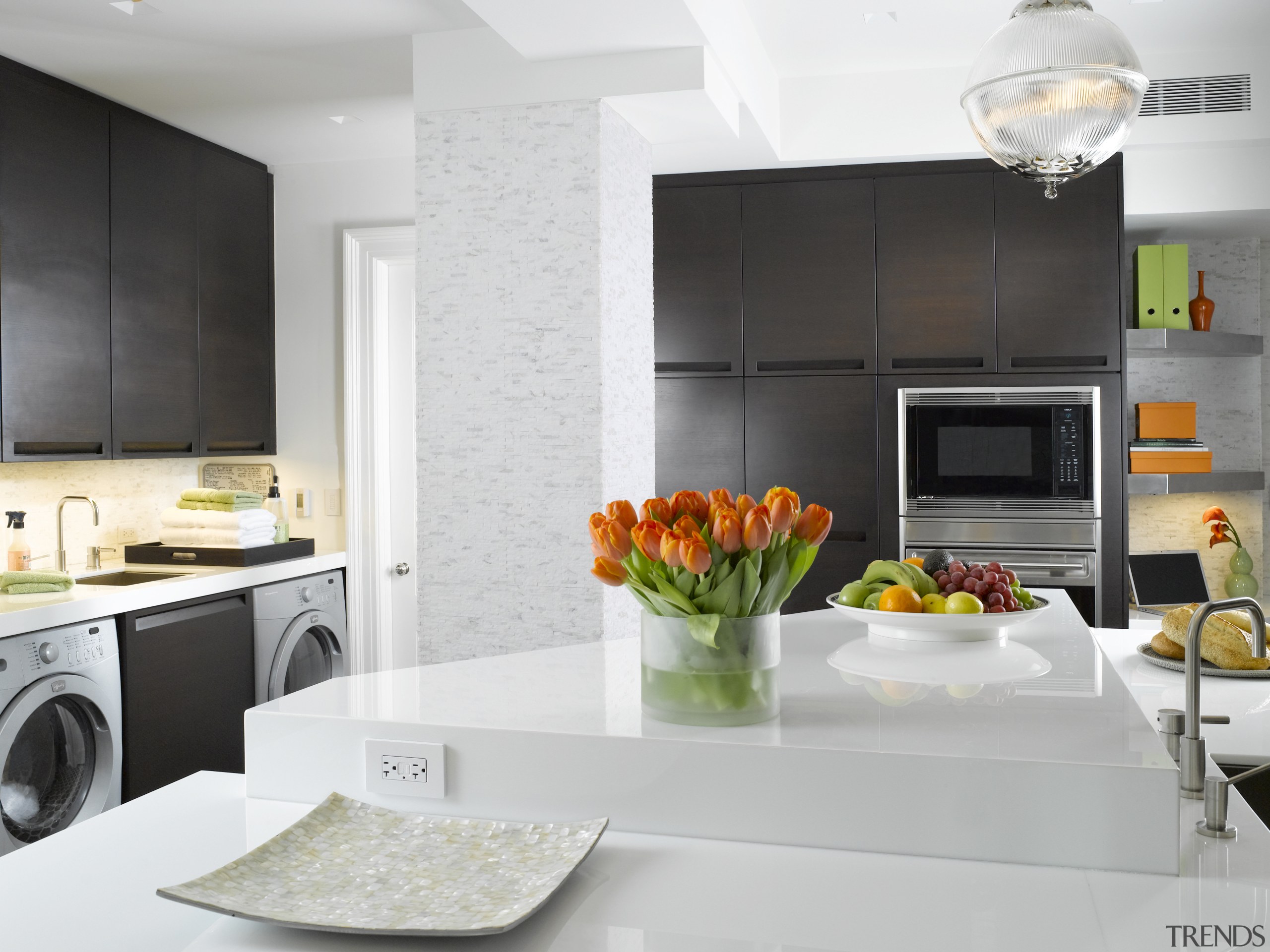 The shape of the glassware cabinet reflects the countertop, home appliance, interior design, interior designer, kitchen, product design, gray, white