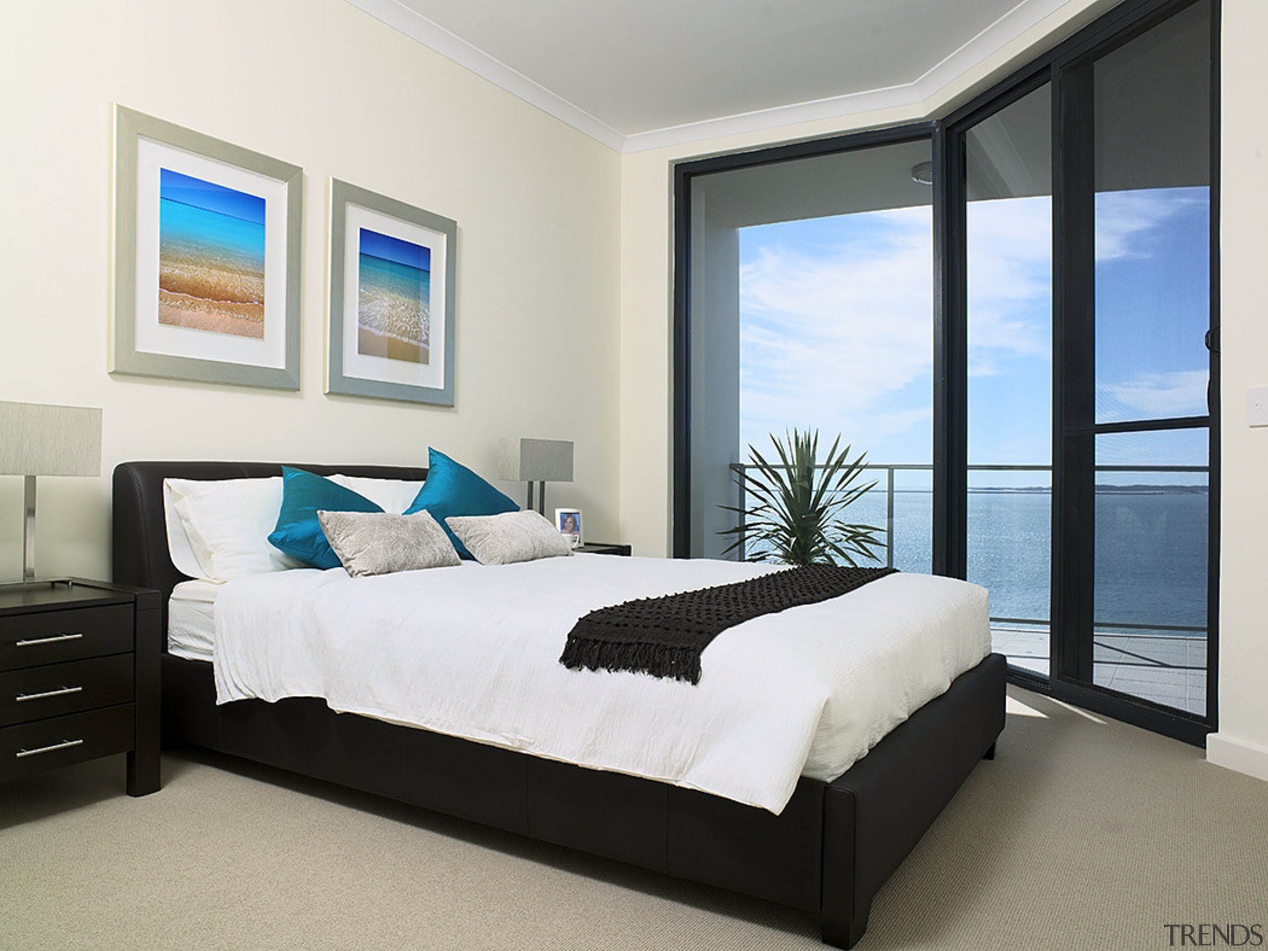 Large balconies allow homeowners to enjoy views of bed, bed frame, bed sheet, bedroom, home, interior design, mattress, property, real estate, room, wall, window, white
