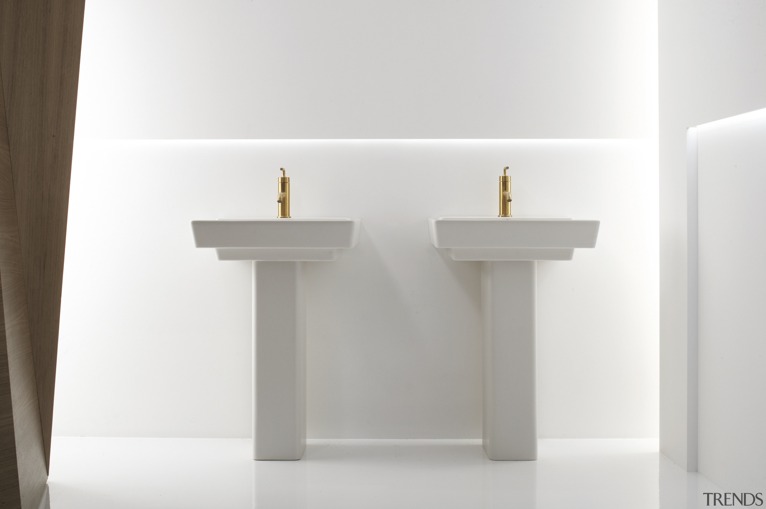 View of a Kohler basin with gold faucets bathroom sink, plumbing fixture, product design, sink, tap, white