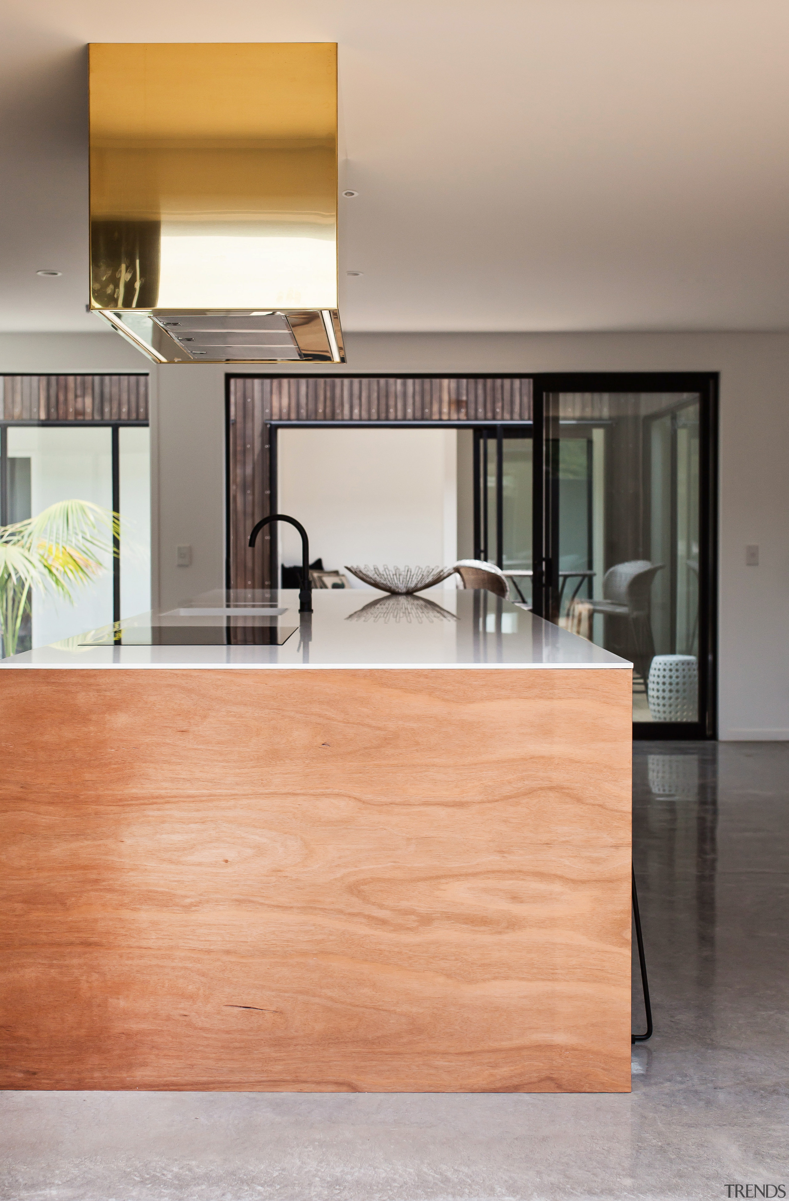 A South-east Asian hardwood adds a warm, natural chest of drawers, countertop, floor, flooring, furniture, hardwood, interior design, kitchen, laminate flooring, plywood, product design, table, wood, wood flooring, gray, orange