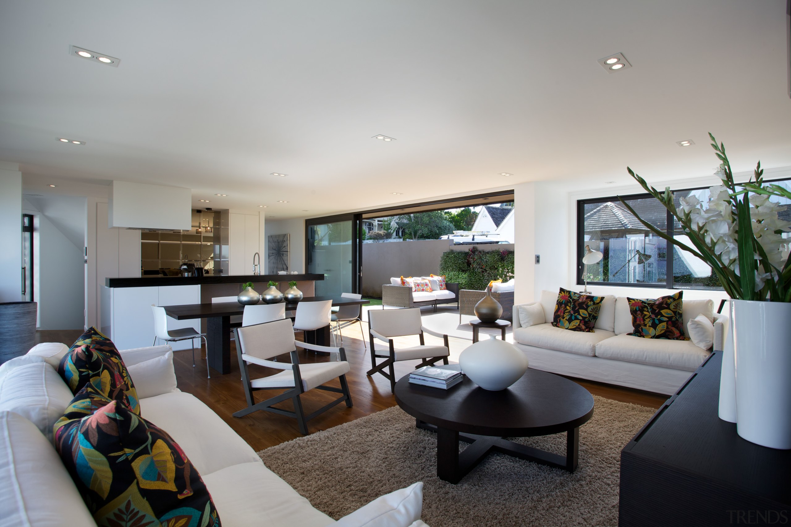 This contemporary townhouse, designed by Paul Izzard, features apartment, architecture, home, house, interior design, living room, real estate, room, gray