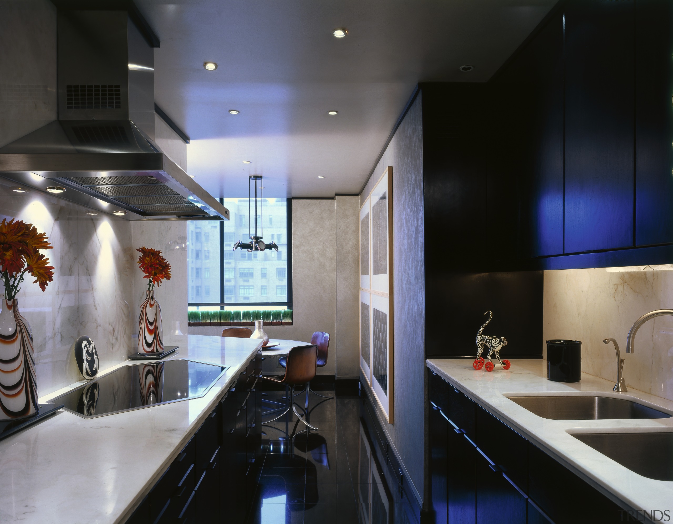 View of this modern kitchen with silver and ceiling, countertop, interior design, kitchen, room, black, gray