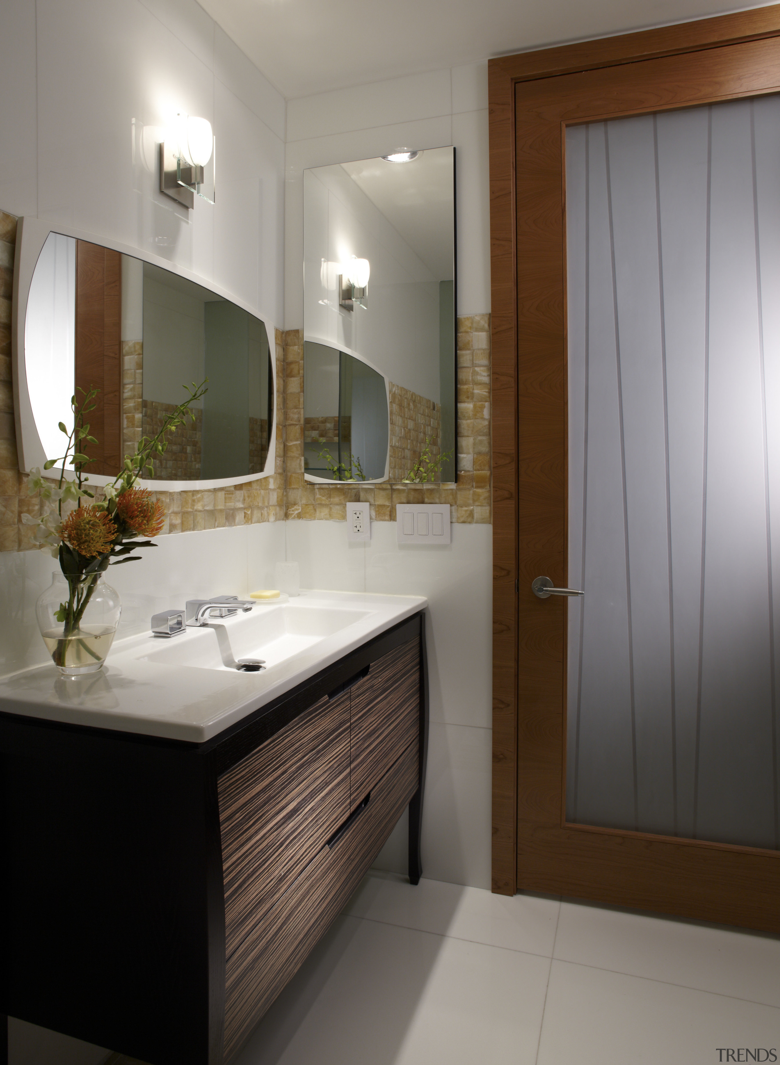 Powder room in a remodeled Miami apartment. The bathroom, bathroom accessory, bathroom cabinet, cabinetry, home, interior design, room, sink, gray