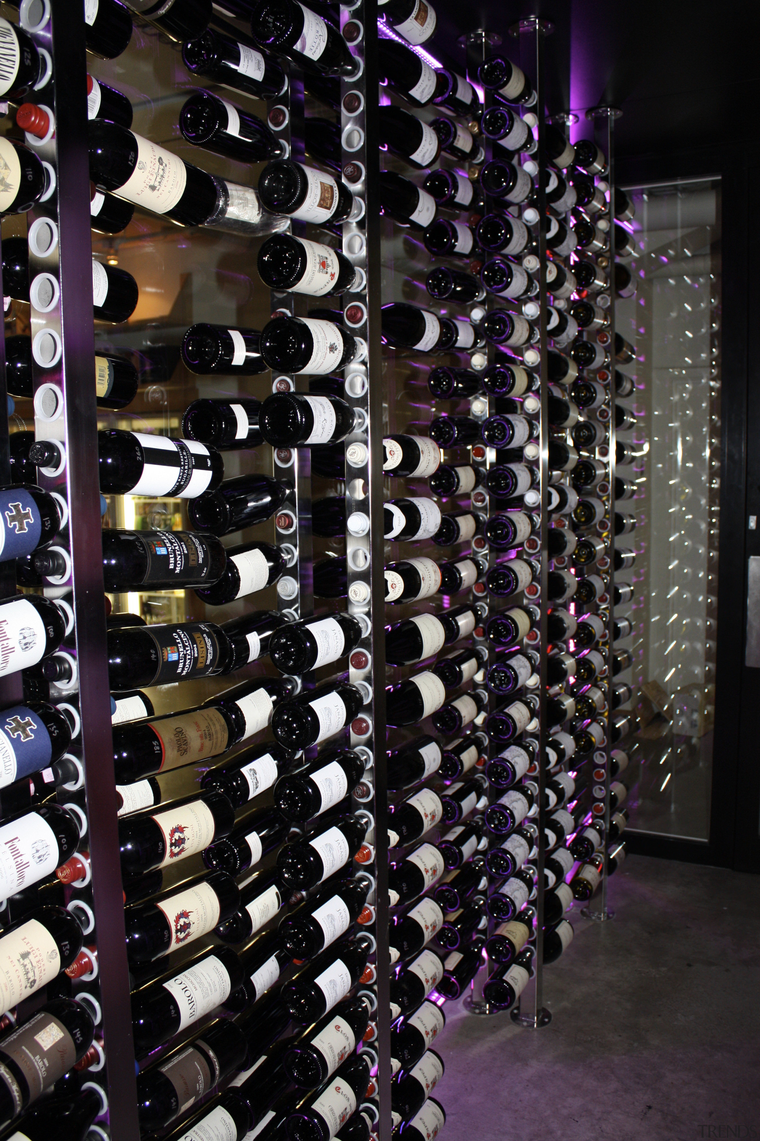 View of refrigeration solution at wine retailer. - purple, wine cellar, winery, black