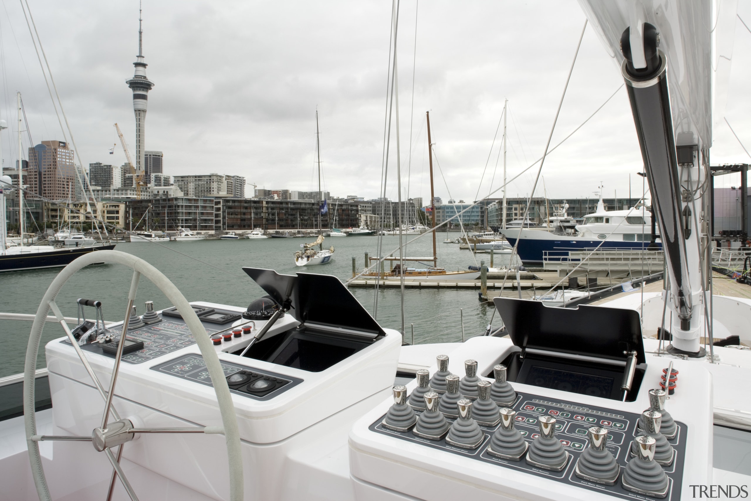 Exterior view of super yacht featuring home theatre boat, marina, sailboat, water, watercraft, yacht, white