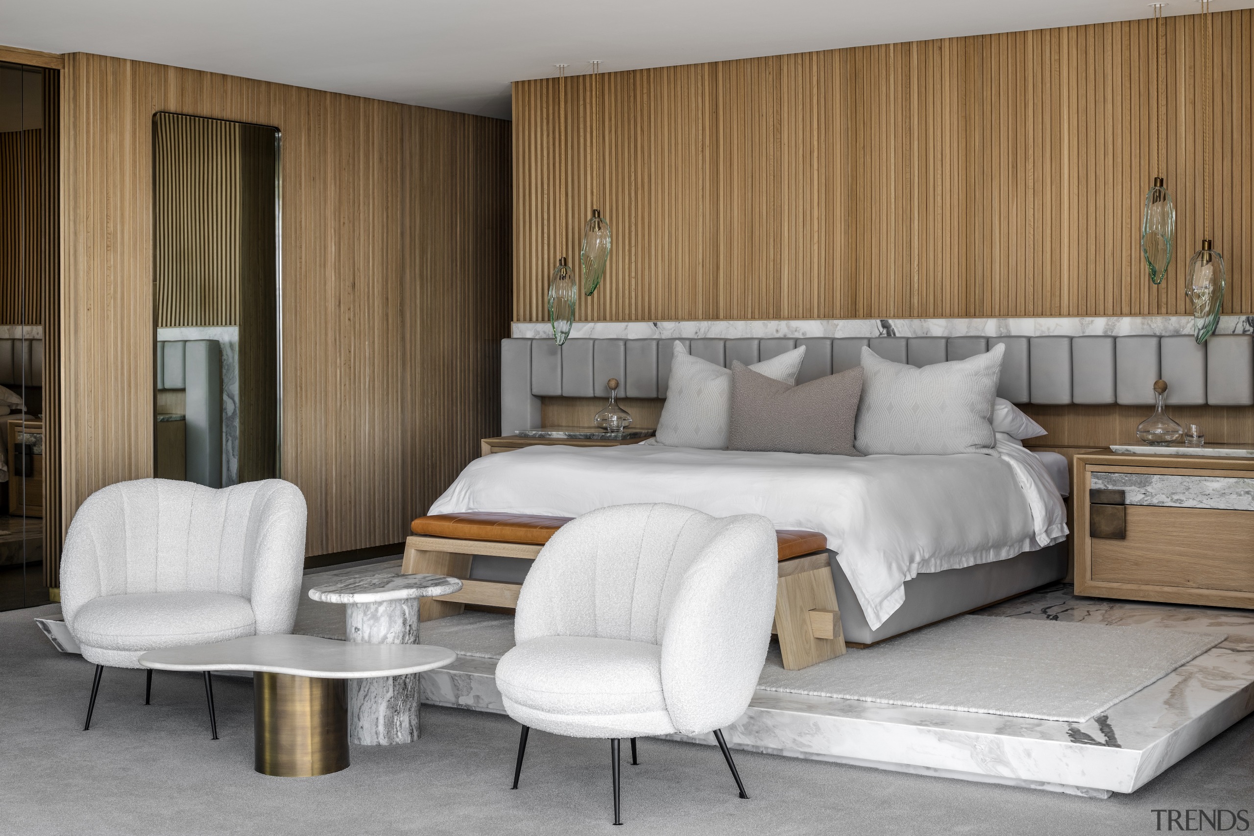 The main suite bedroom that features an elevated 