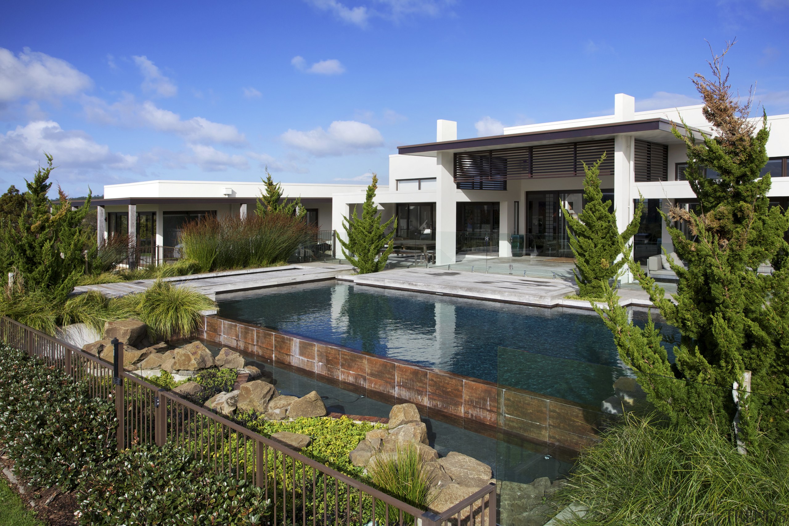 Contemporary outdoor area - Contemporary outdoor area - cottage, estate, facade, home, house, mansion, property, real estate, residential area, resort, swimming pool, villa, brown, teal