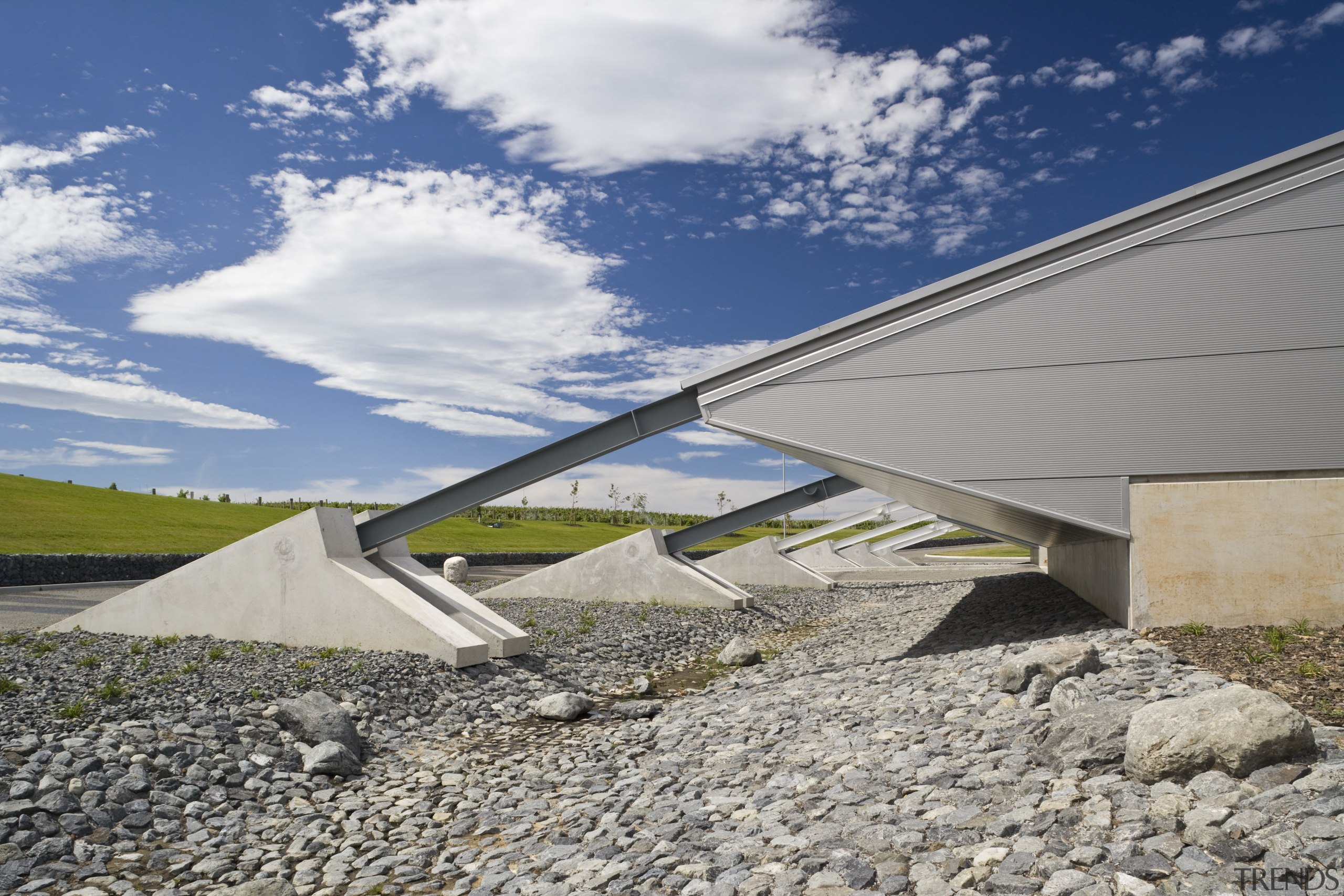 View of Buttresses coming off the side of architecture, cloud, daylighting, fixed link, house, real estate, roof, sky, gray