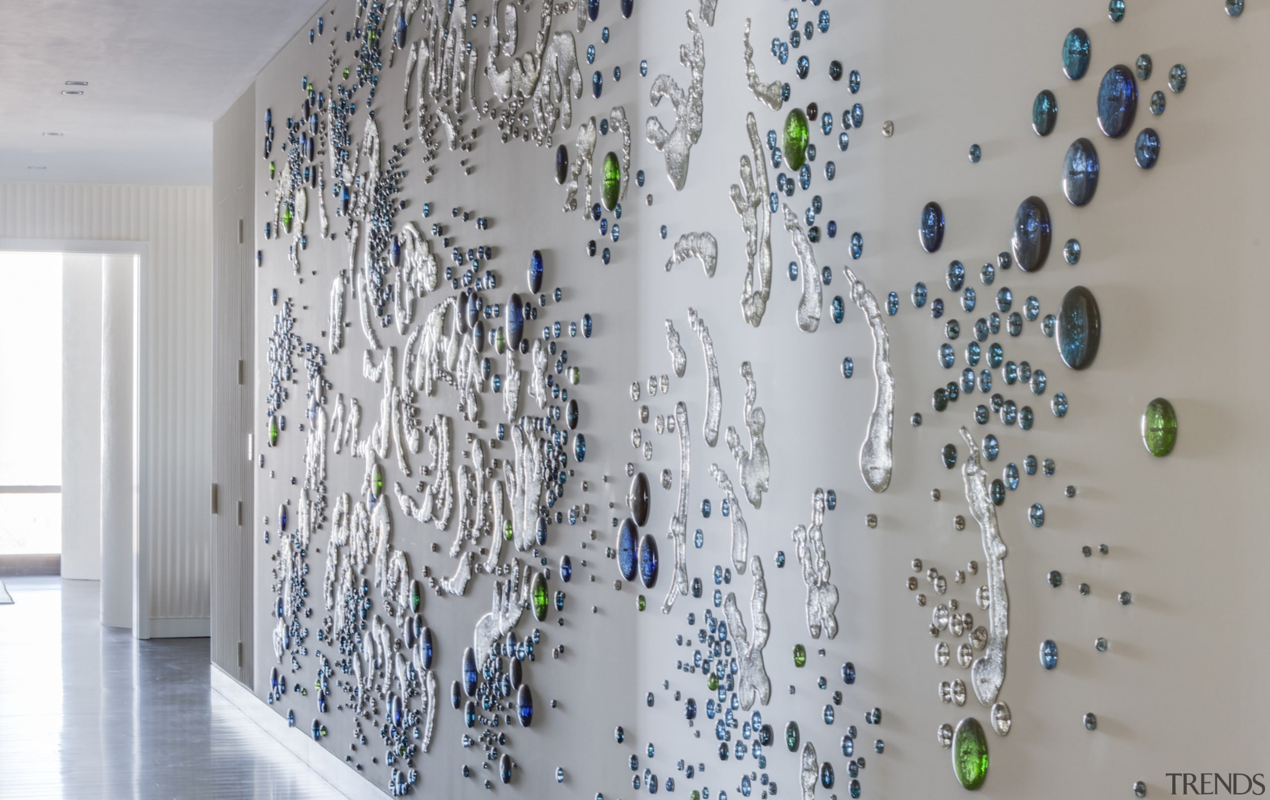 The interior designers commissioned this Rob Wynne wall 