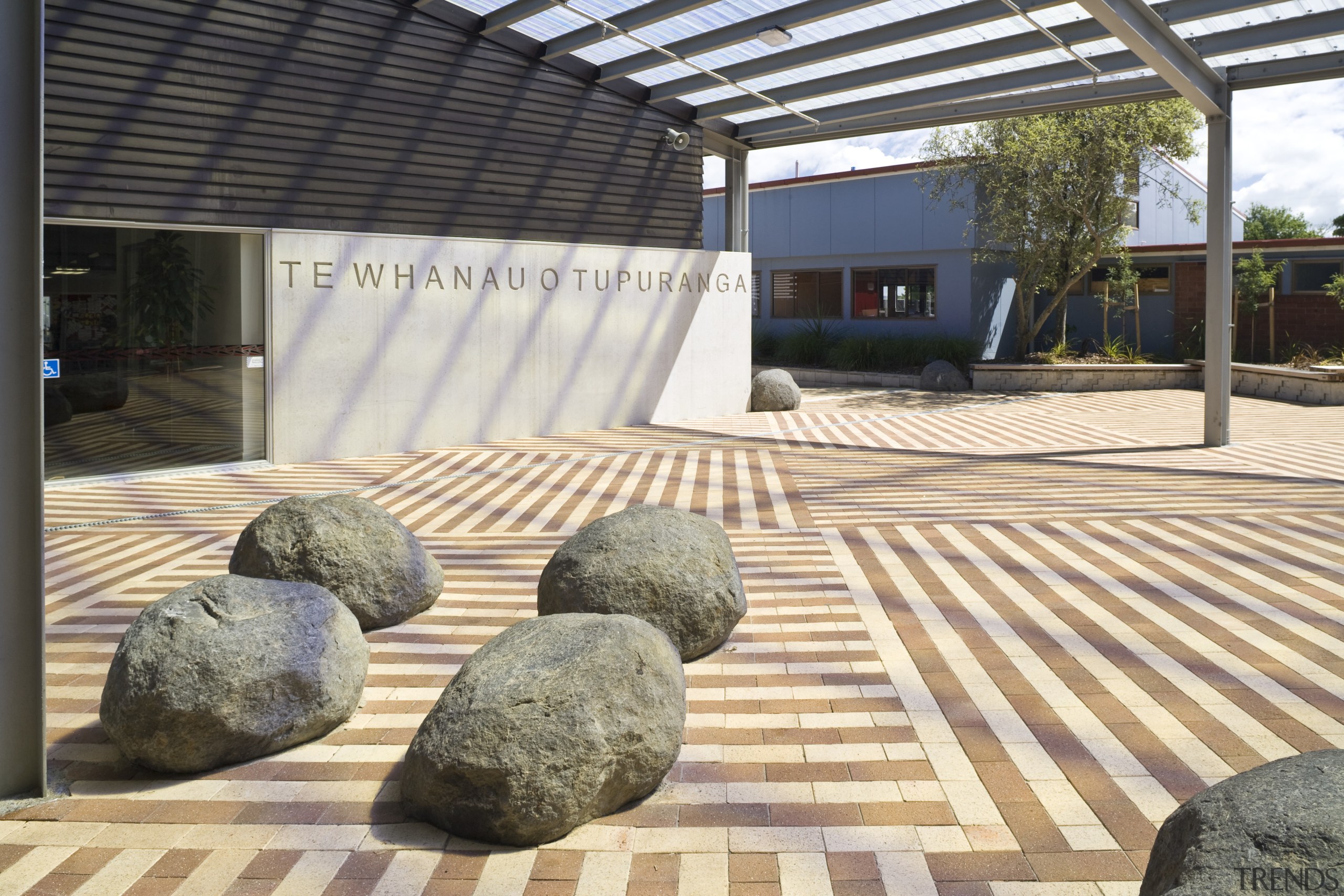 Image of Te Whanau o tupuranga school which floor, flooring, outdoor structure, white, black