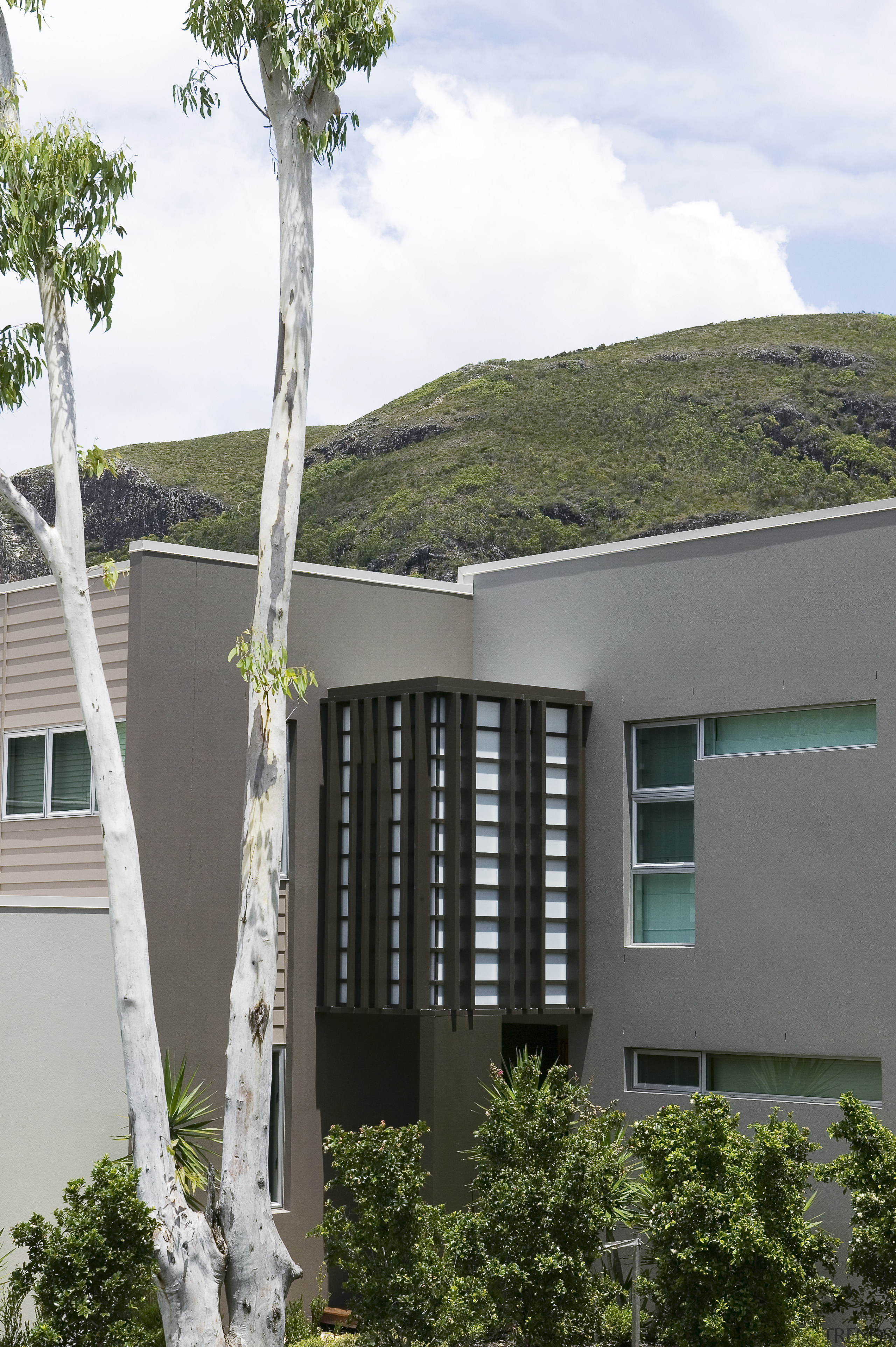 A view of some balustrades from Aluminium Balustrades. architecture, building, condominium, facade, home, house, plant, property, real estate, residential area, tree, window, gray, white