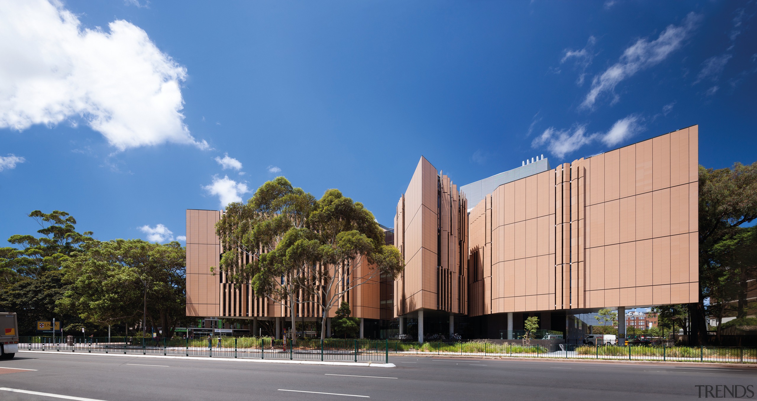 The new Tyree Energy Technologies Building at the architecture, building, campus, commercial building, corporate headquarters, daytime, facade, headquarters, landmark, metropolitan area, mixed use, real estate, residential area, sky, teal