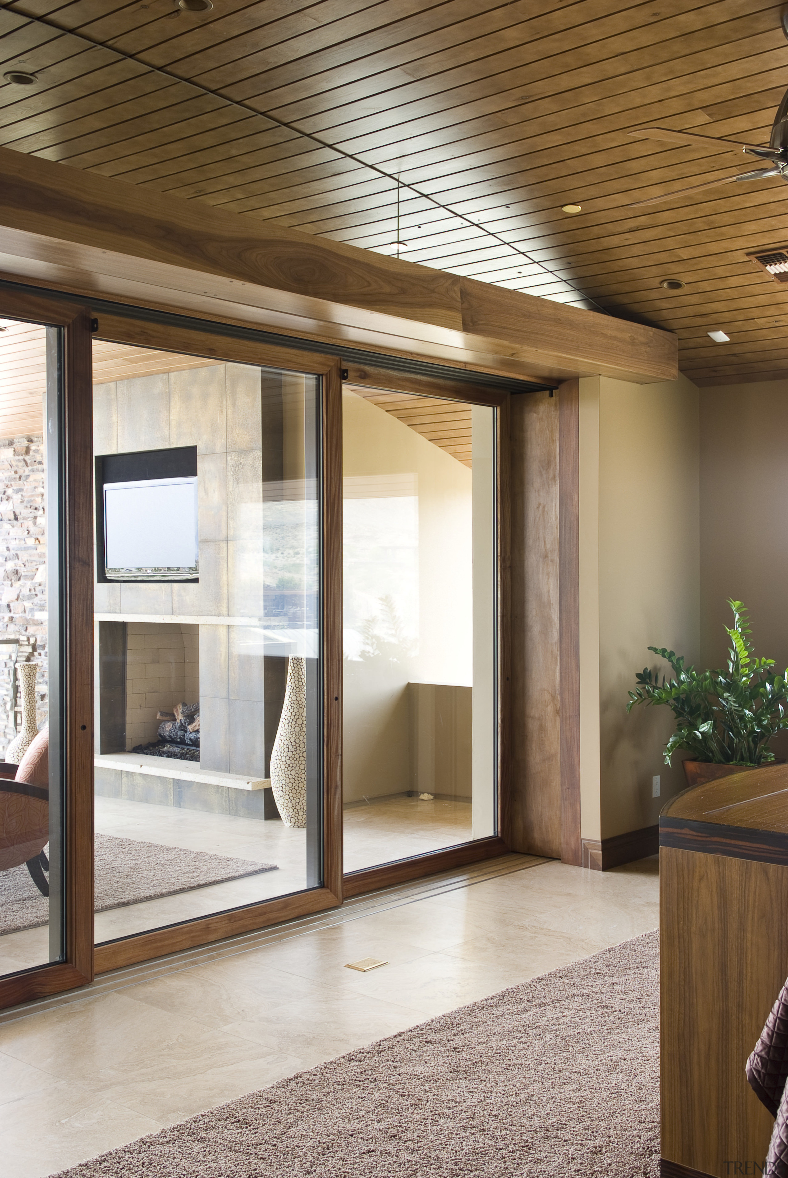 Interior view of this home built by Sun ceiling, door, floor, flooring, interior design, lobby, window, wood, brown, white