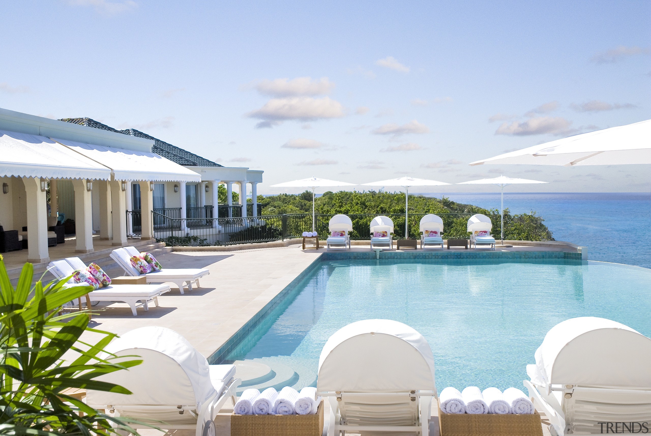 This home was designed by Geoffrey Bradfield. Here estate, home, hotel, leisure, property, real estate, resort, resort town, sea, swimming pool, vacation, villa, teal, white