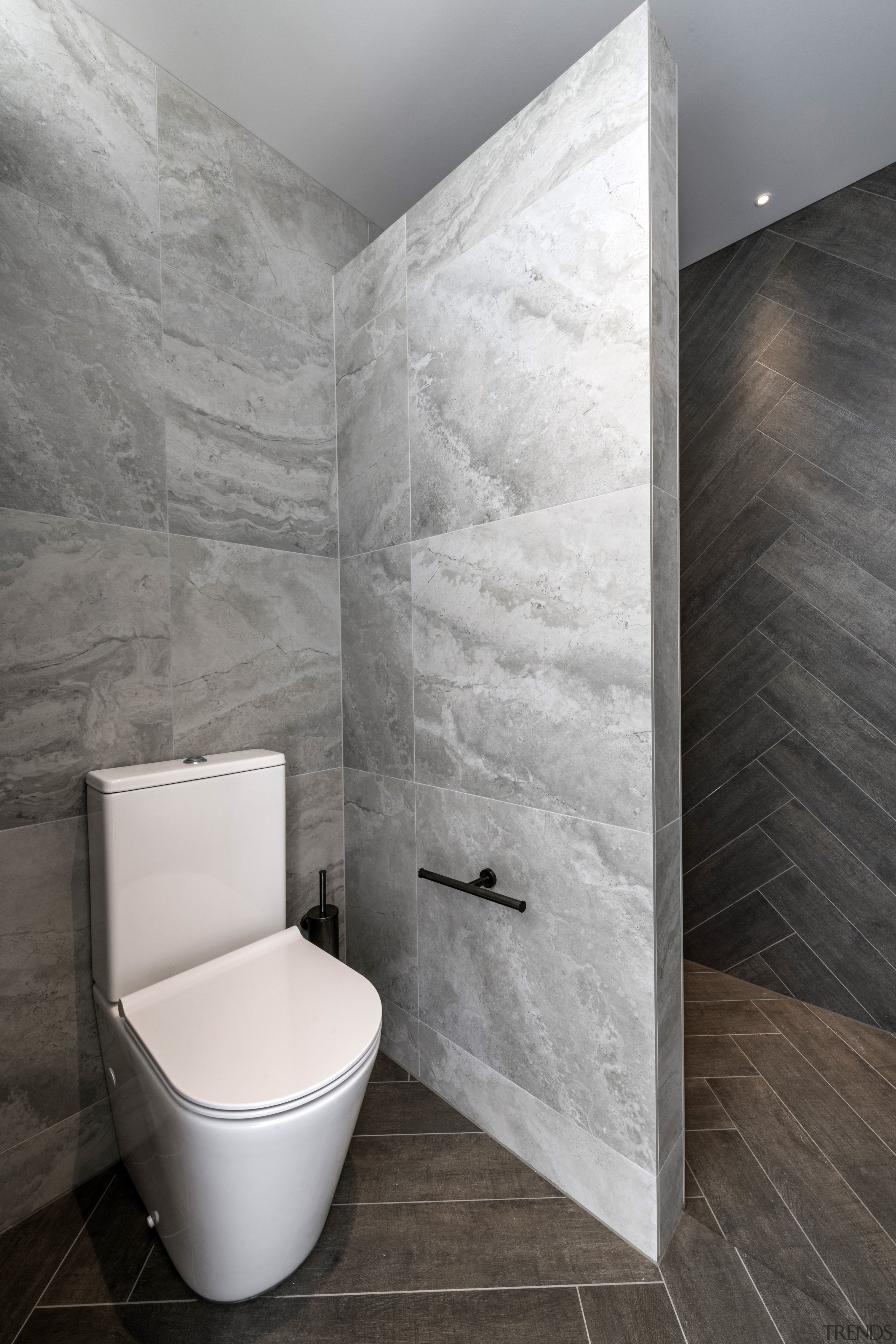 At one end of the bathroom, a large 