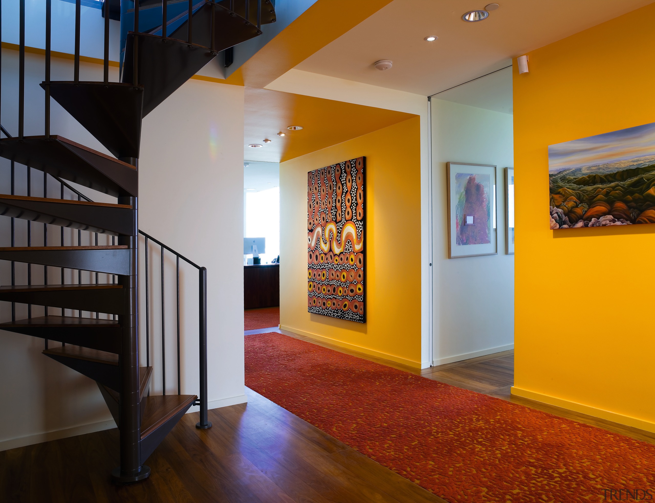 A view of the hallway featuring bright yellow architecture, ceiling, interior design, real estate