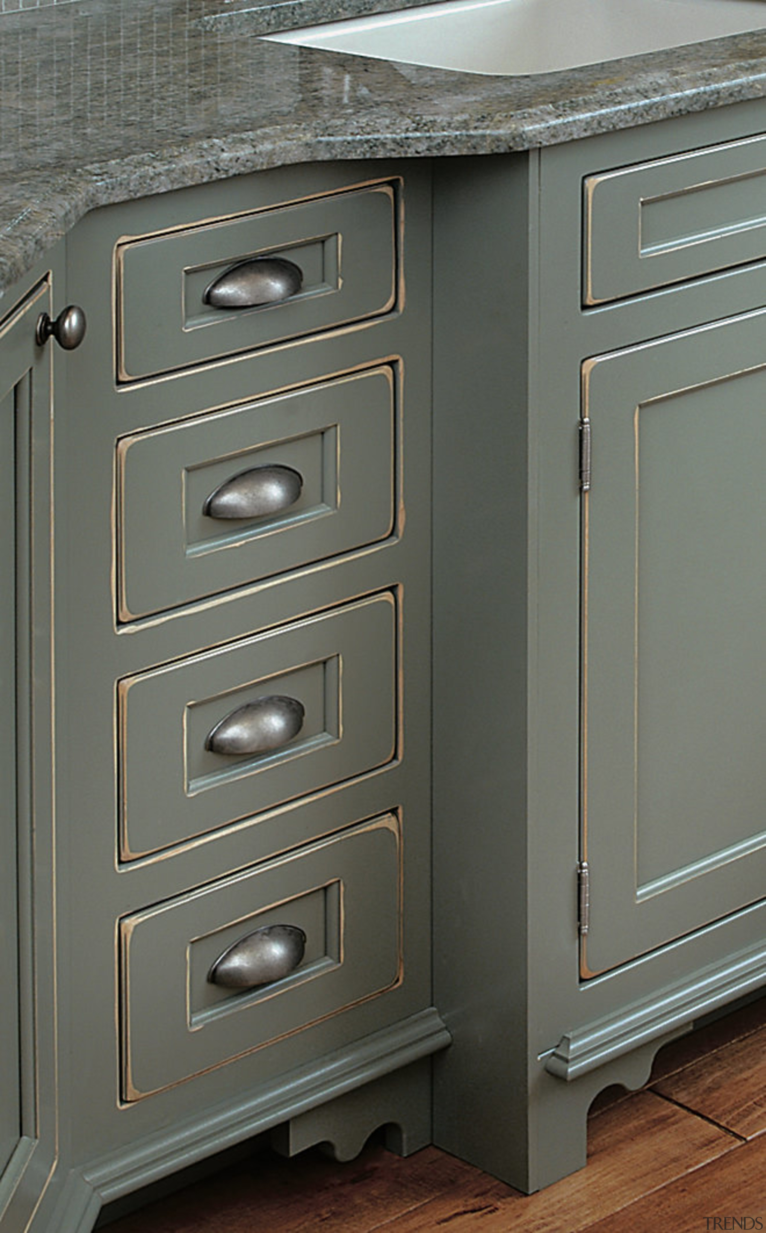 view of this kicthen cabinet where touches of cabinetry, chest of drawers, drawer, furniture, wood stain, gray