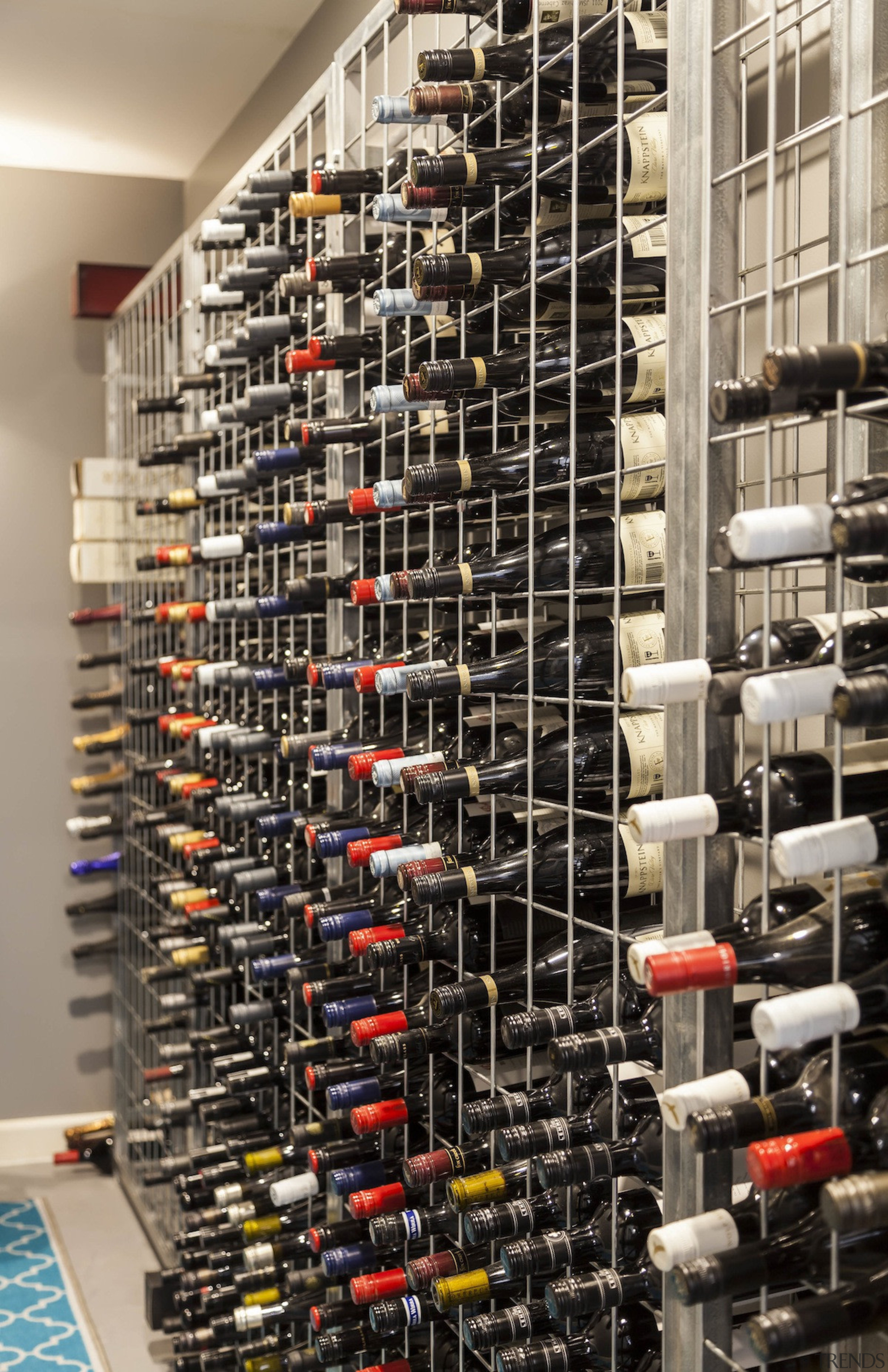 The wine cellar is simple and functional - inventory, wine cellar, black, gray