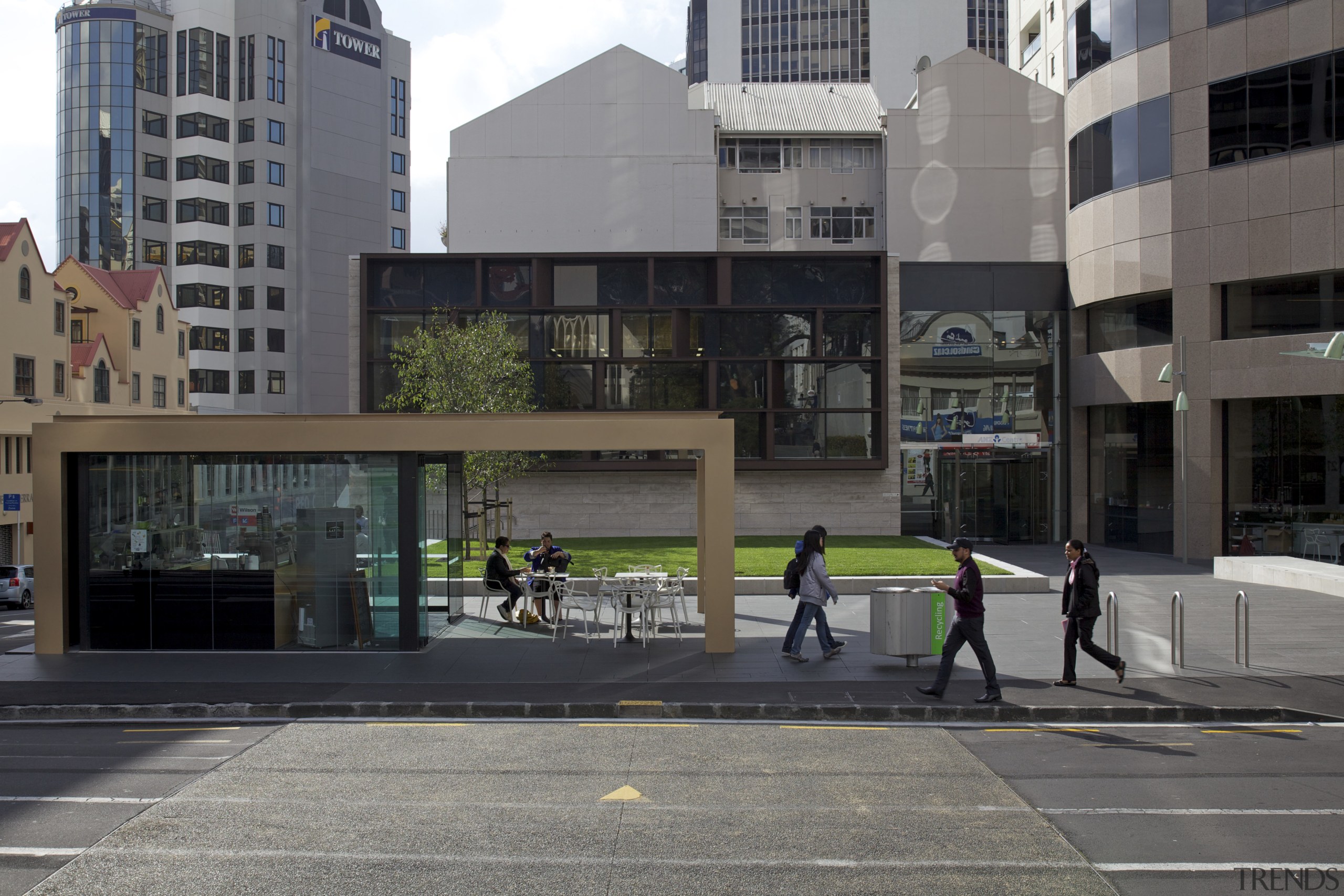 A kiosk was designed to service the plaza architecture, building, city, condominium, downtown, facade, infrastructure, metropolitan area, mixed use, neighbourhood, pedestrian, residential area, road, street, urban area, urban design, gray, black