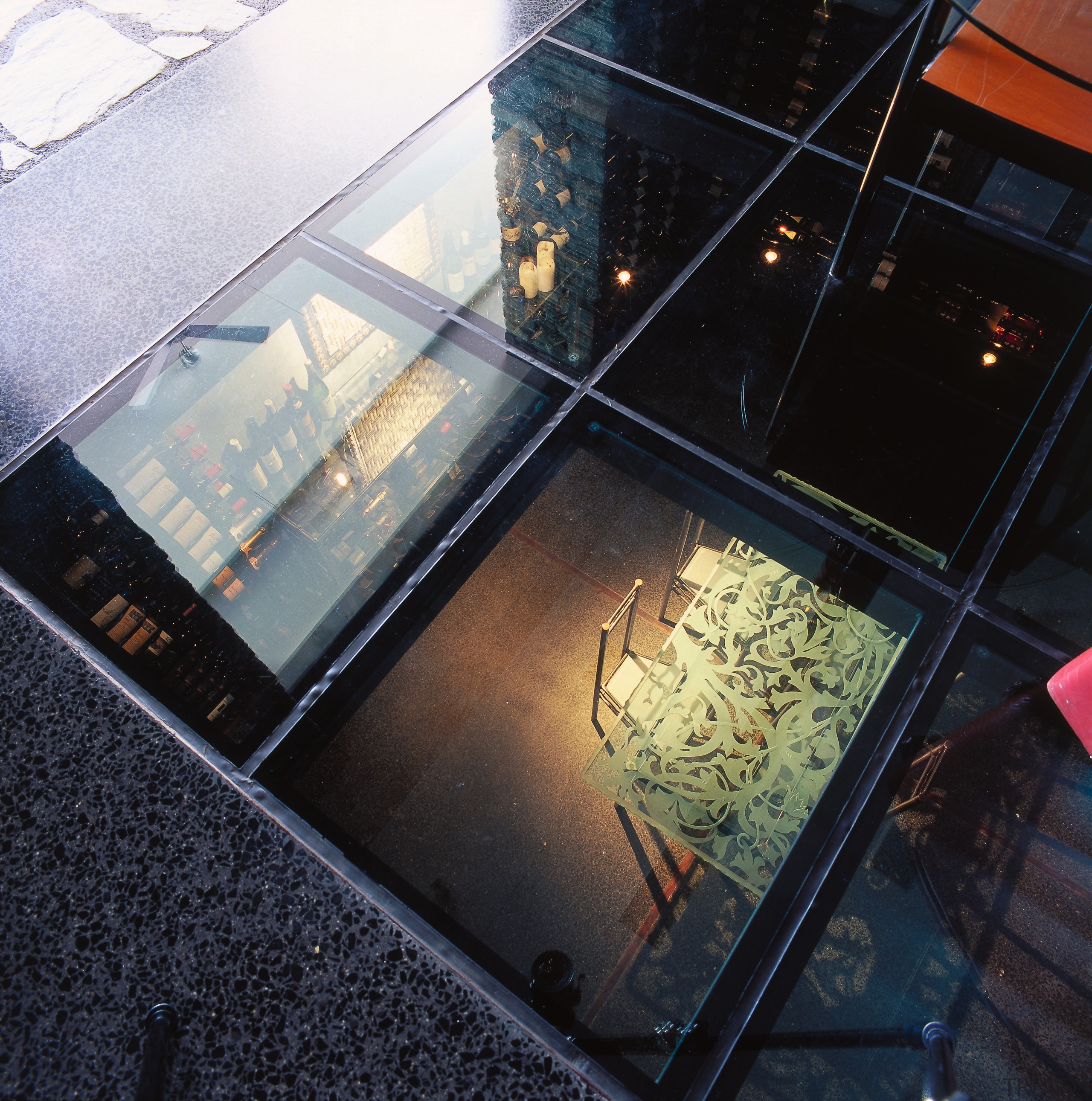 view of the glass floor panels that look daylighting, floor, glass, light, reflection, black