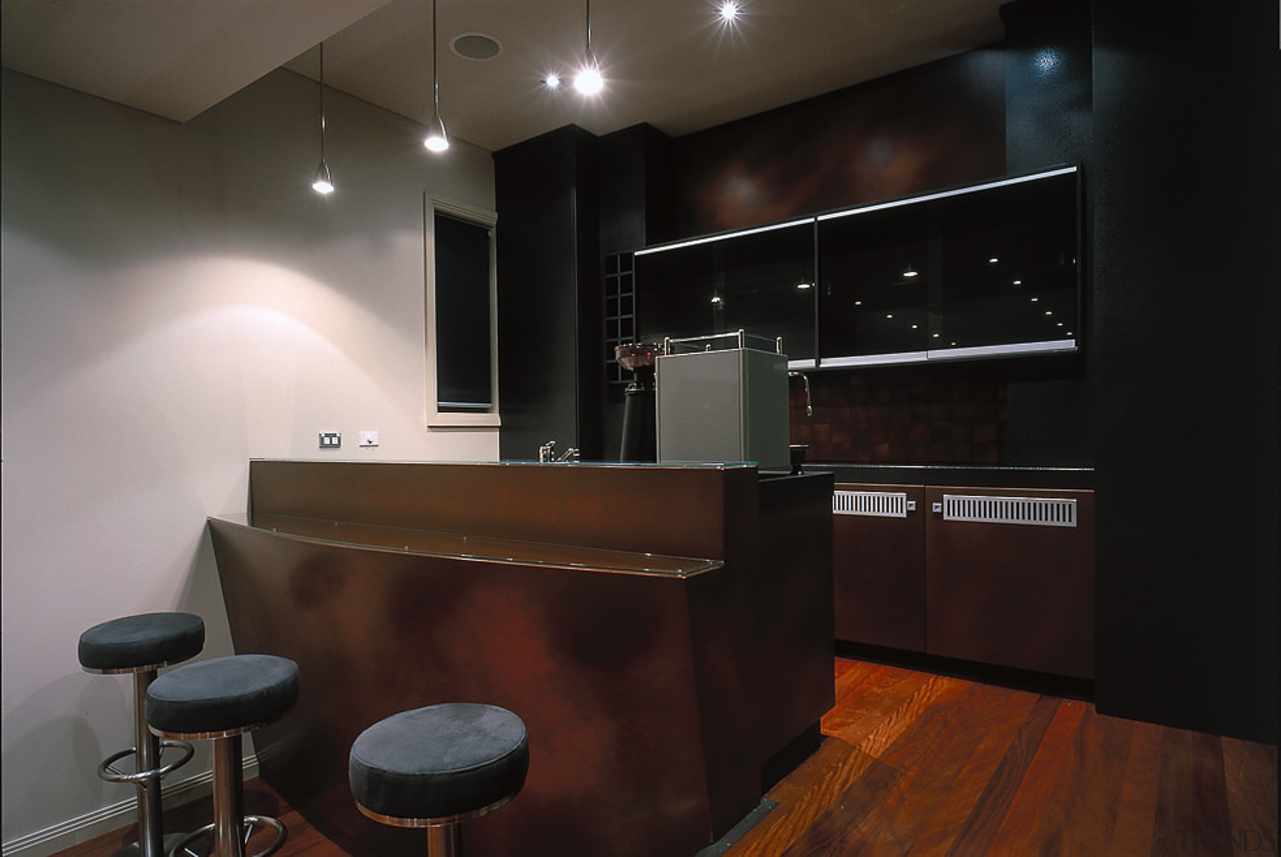 A view of a bar top with axolotl cabinetry, countertop, flooring, interior design, kitchen, lighting, room, black