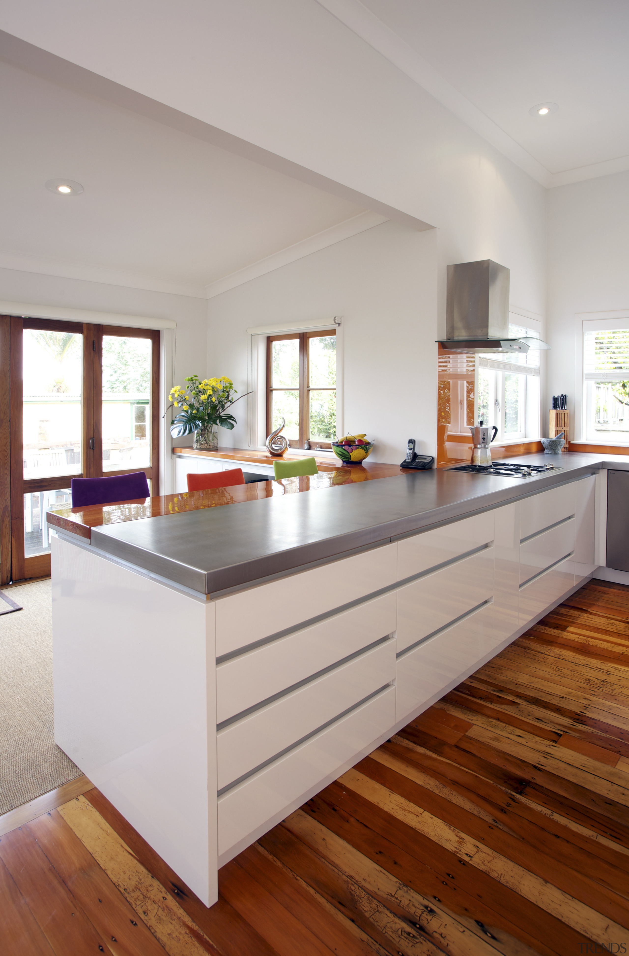 This clean-lined kitchen is by  RH Cabinetmakers cabinetry, countertop, cuisine classique, floor, flooring, hardwood, interior design, kitchen, laminate flooring, real estate, room, wood flooring, gray