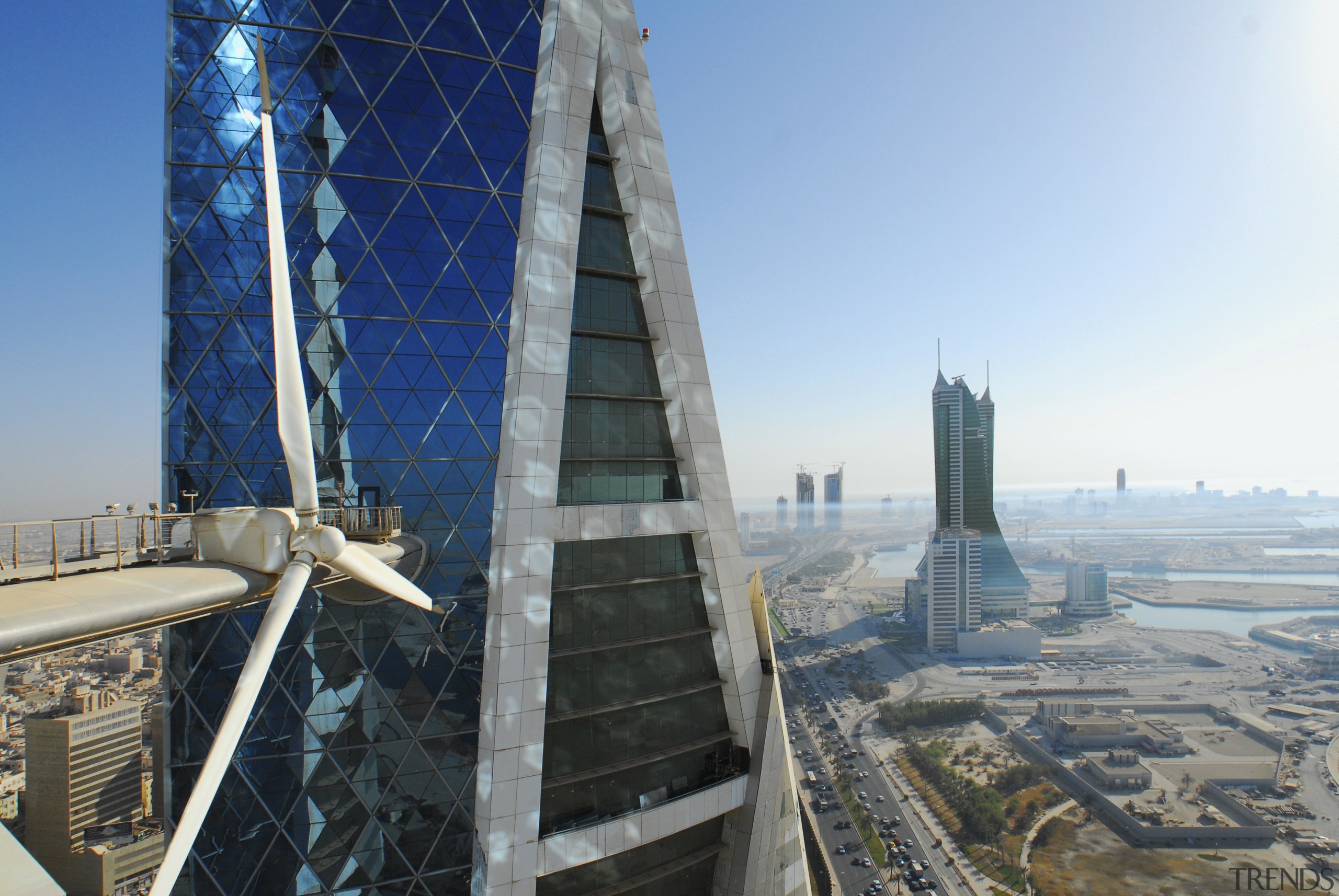 The new Bahrain world Trade Centre meets up architecture, building, city, cityscape, daytime, landmark, metropolis, metropolitan area, sky, skyline, skyscraper, tower, tower block, urban area