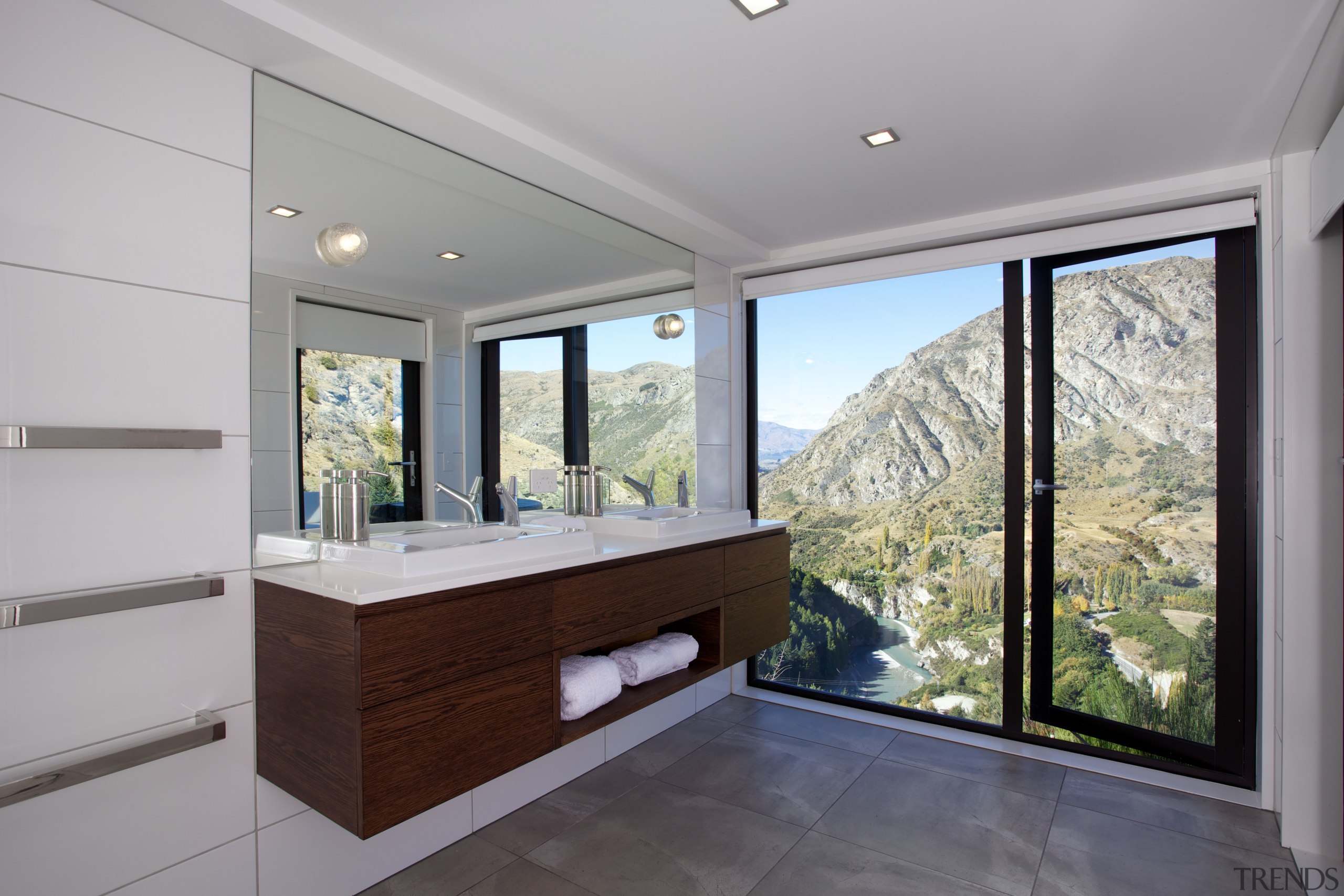 This reinvented master bathroom has floor-to-ceiling windows to estate, home, house, interior design, property, real estate, window, gray