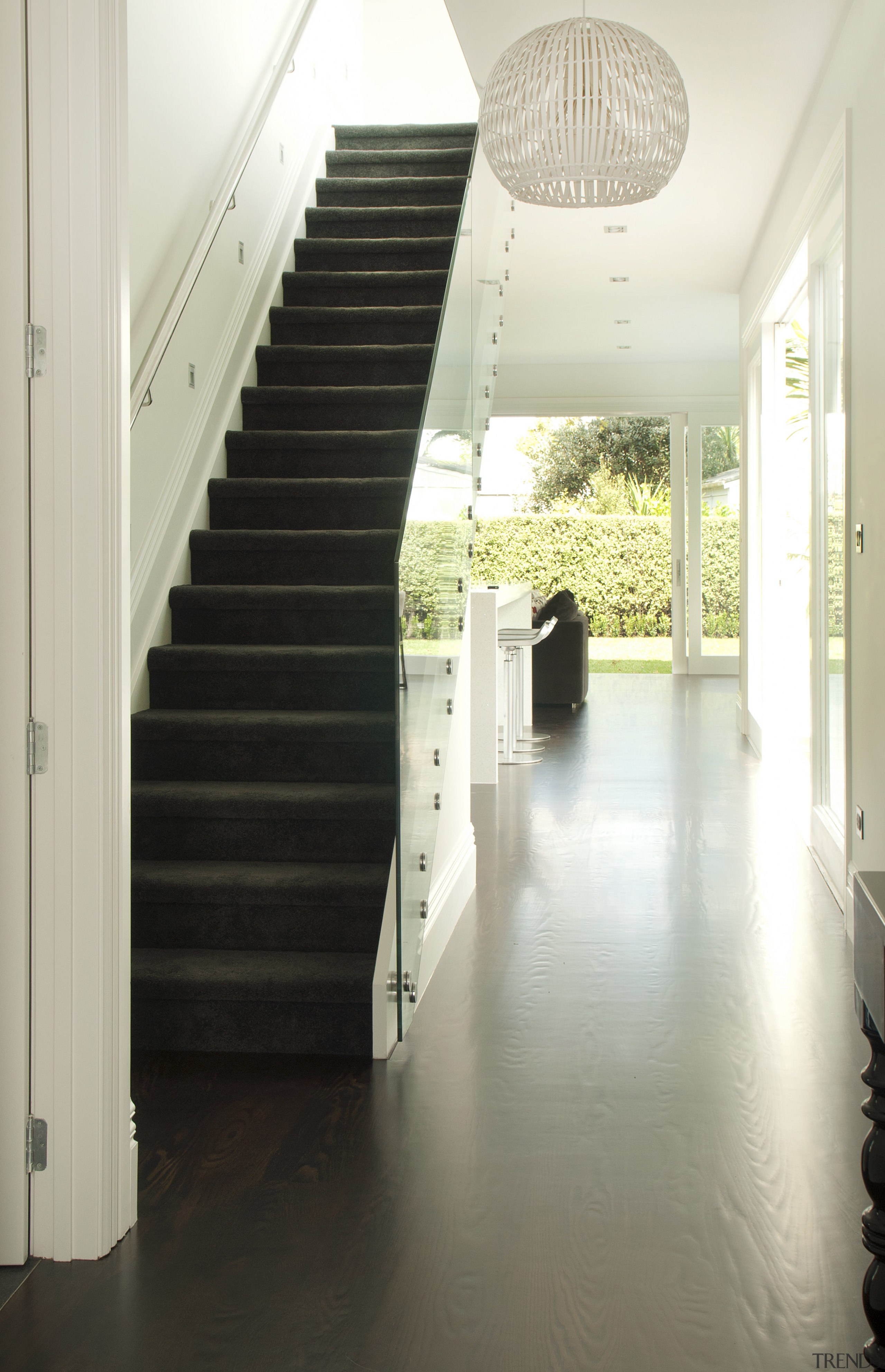 View of carpeted stairs with white walls. - architecture, ceiling, daylighting, floor, flooring, hardwood, home, house, interior design, laminate flooring, property, stairs, wood, wood flooring, white