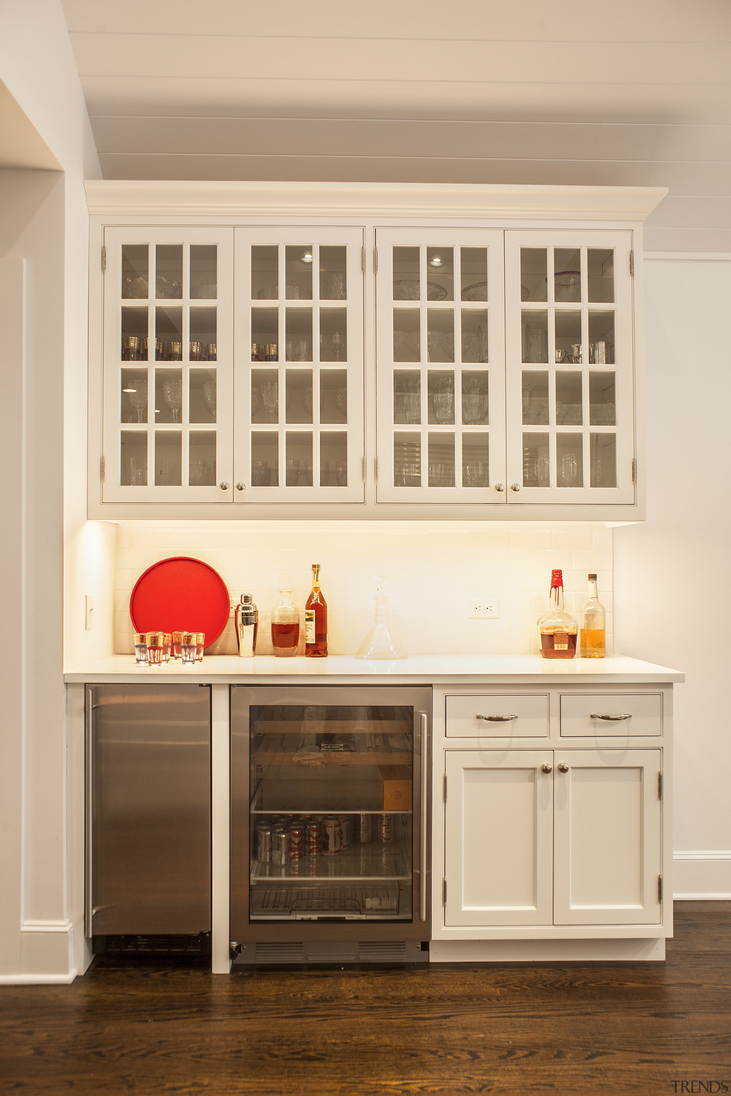 A separate bar area is outside the main cabinetry, countertop, cuisine classique, furniture, home, interior design, kitchen, room, shelving, window, orange, brown