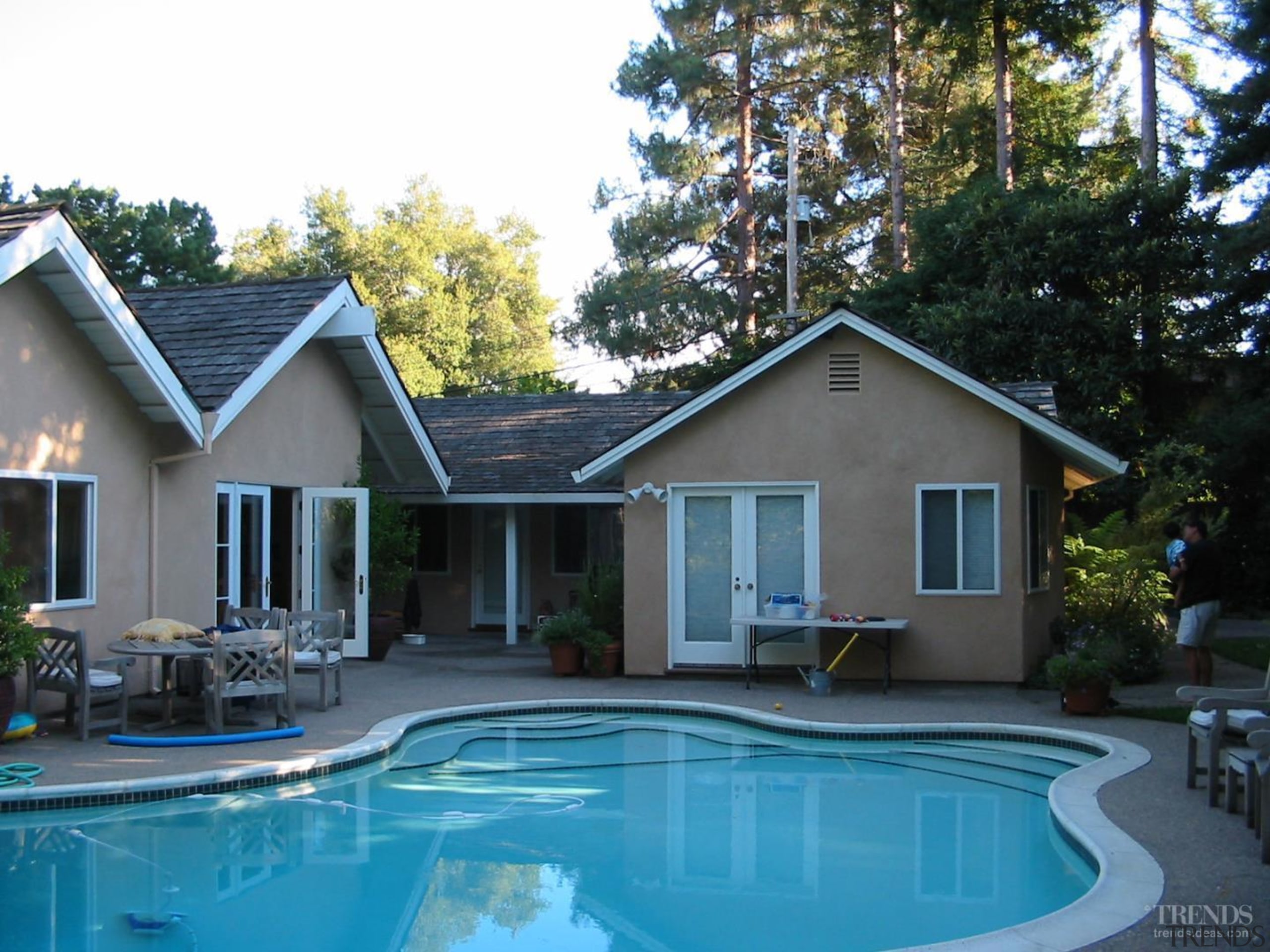The original house also opened to the pool. backyard, cottage, estate, home, house, property, real estate, residential area, roof, siding, swimming pool, villa, window, black, teal