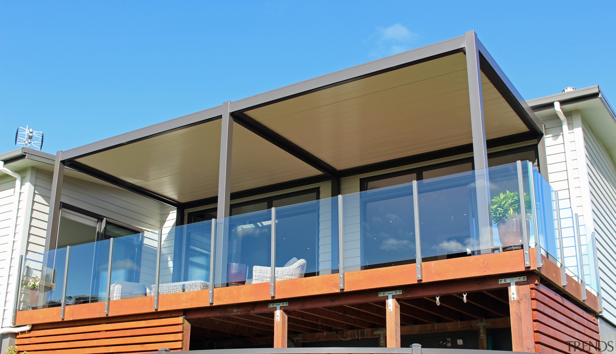 HomePlus Tauranga fitted three Bask louvre roofs for balcony, daylighting, facade, house, porch, real estate, roof, shade, siding, window, teal