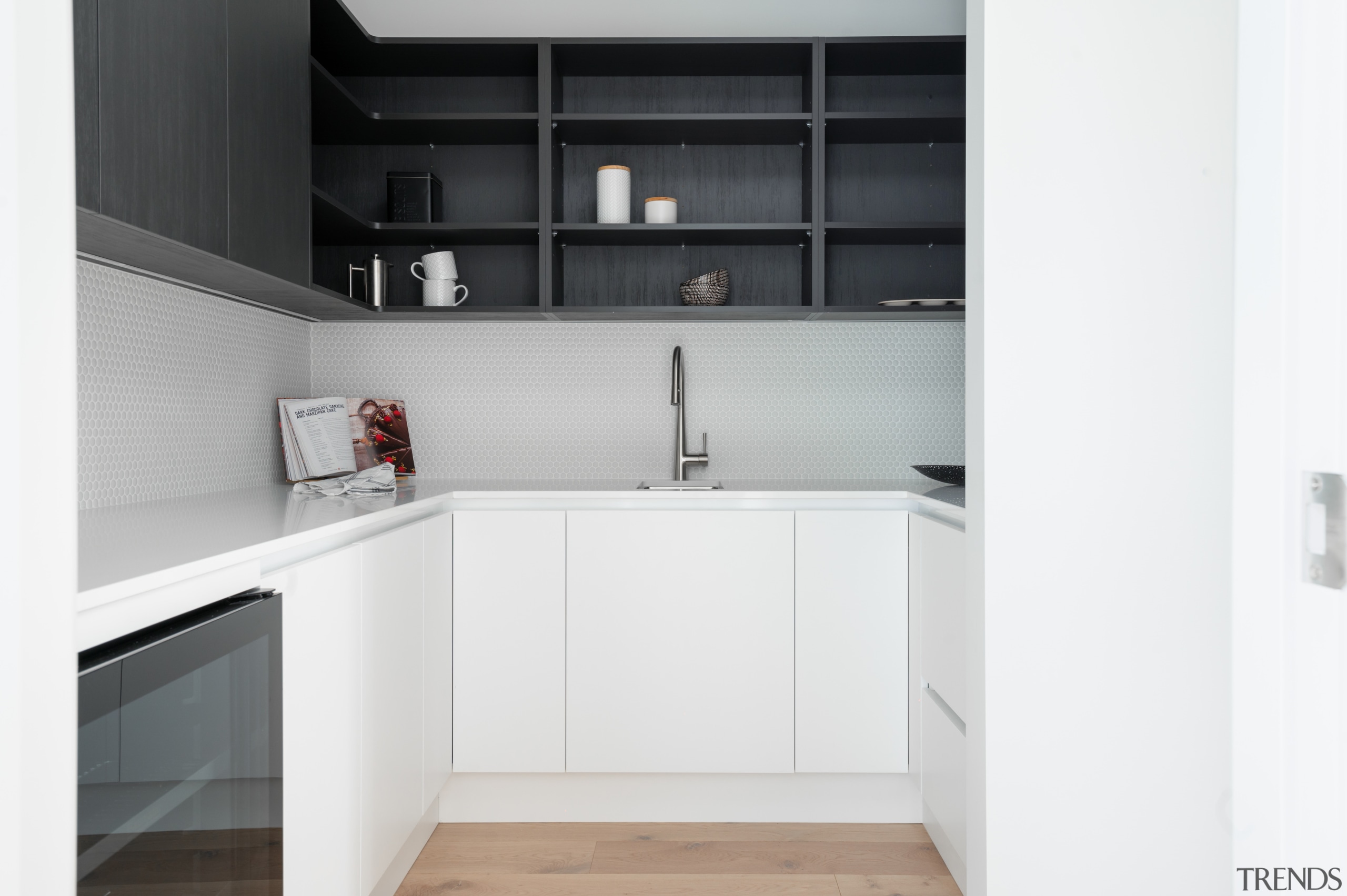 Mosaix Penny Round White glass mosaics adorn the 