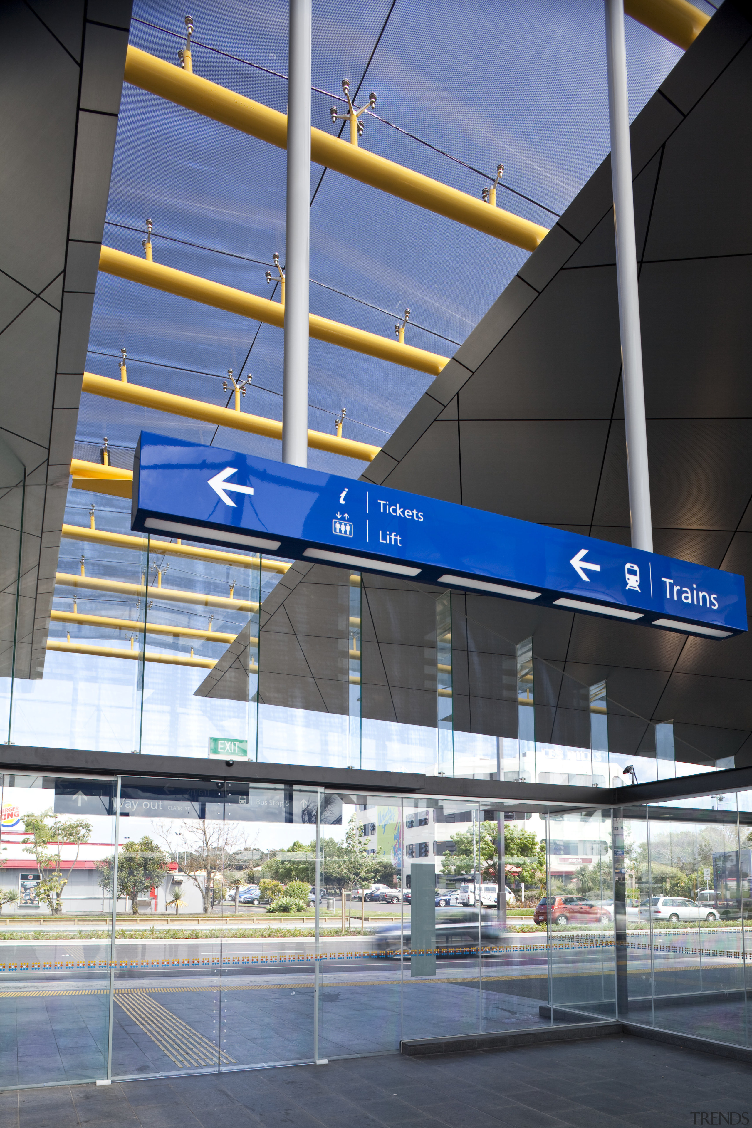 View of the renovated New Lynn Railway Station airport terminal, architecture, building, corporate headquarters, daytime, infrastructure, metropolitan area, sky, structure, urban area, blue