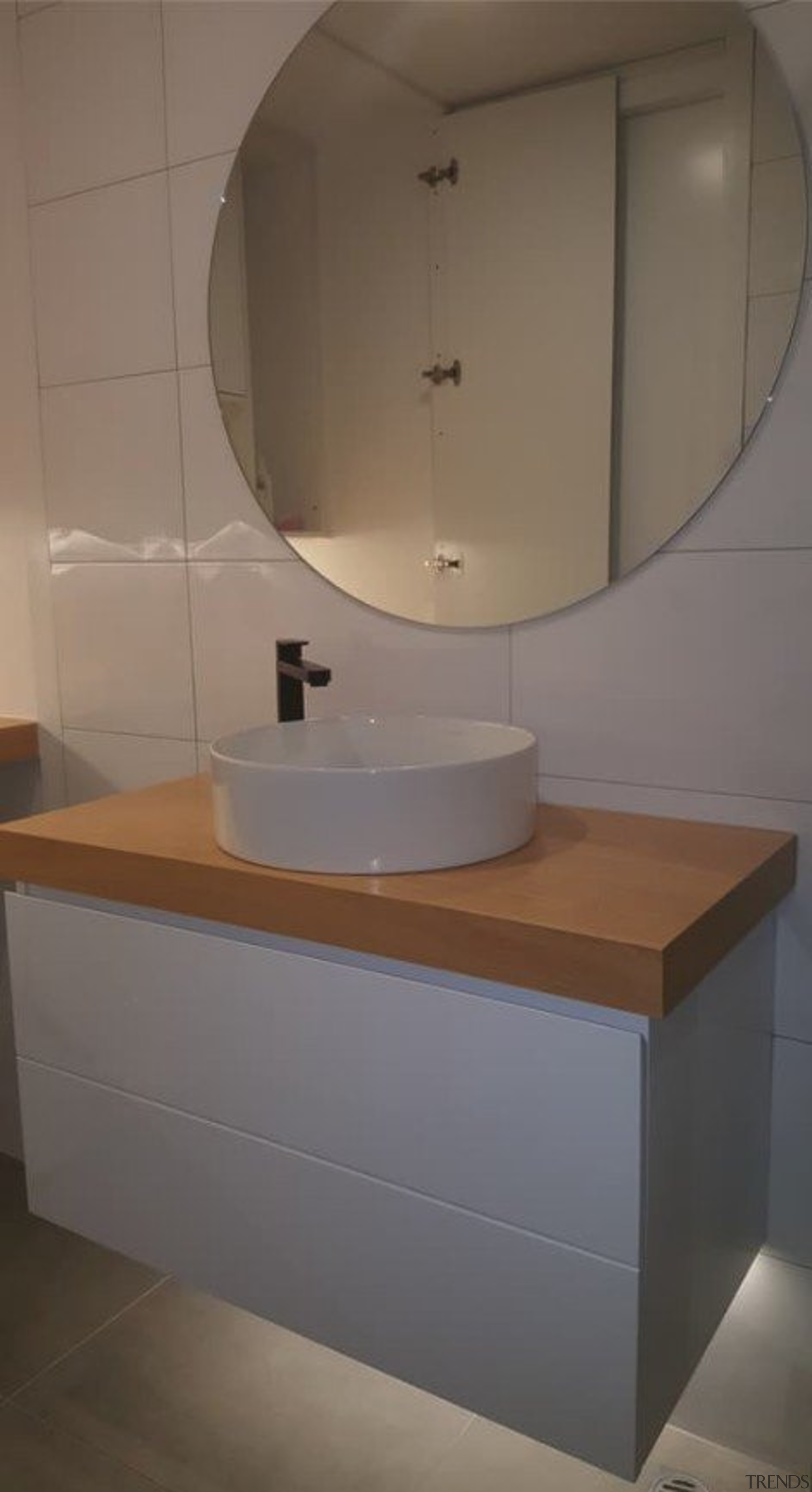 Read more about happy clients - Renovation in angle, bathroom, bathroom accessory, bathroom cabinet, bathroom sink, floor, interior design, plumbing fixture, room, sink, tap, tile, toilet seat, gray, brown