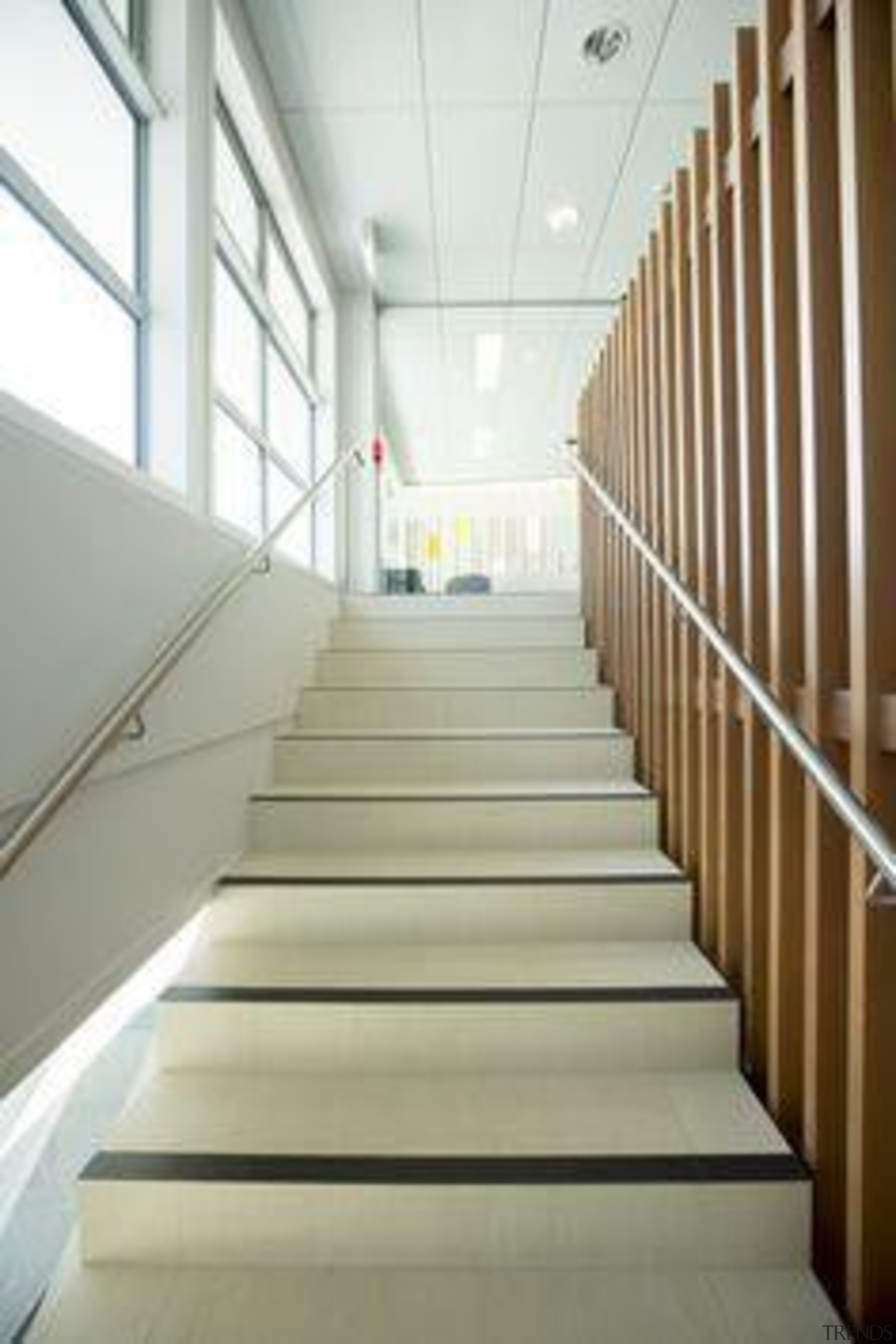 Floor featuring Naturali travertino avorio. - Network Tasman architecture, daylighting, floor, handrail, interior design, stairs, white