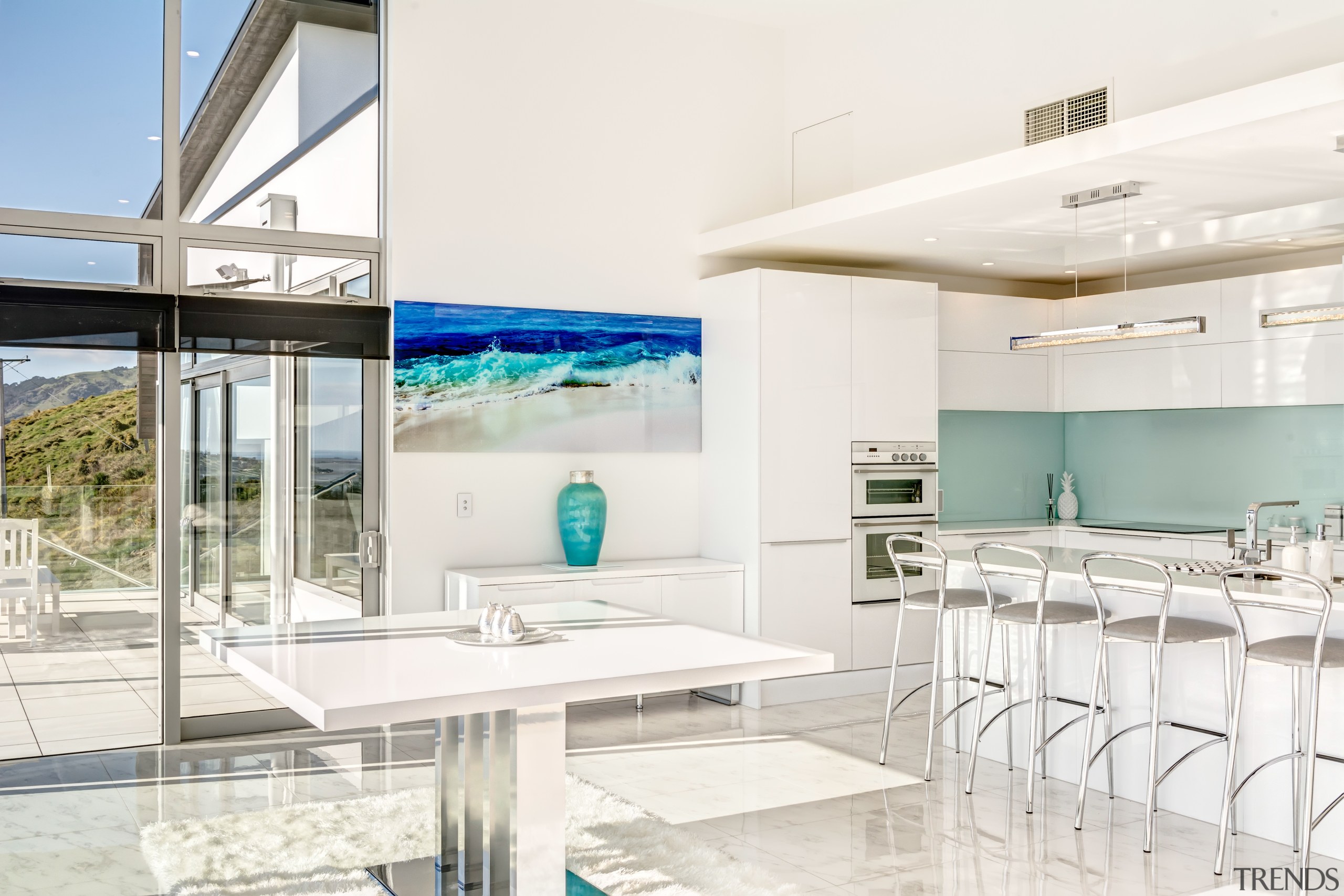 Glass and white surfaces predominate in this European-style architecture, house, interior design, real estate, white