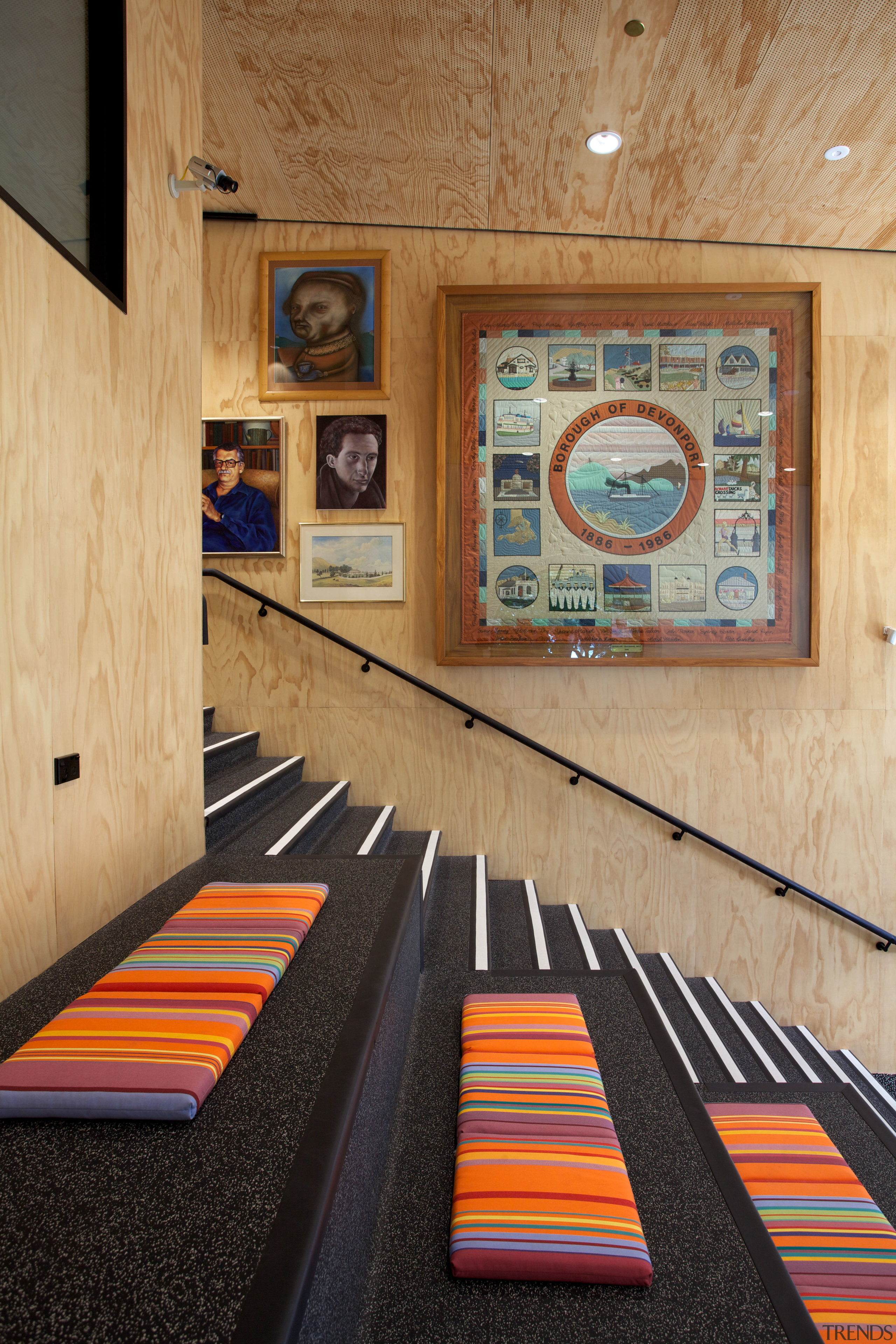 The young adults section of the Devonport Library carpet, floor, flooring, interior design, room, table, wood, orange