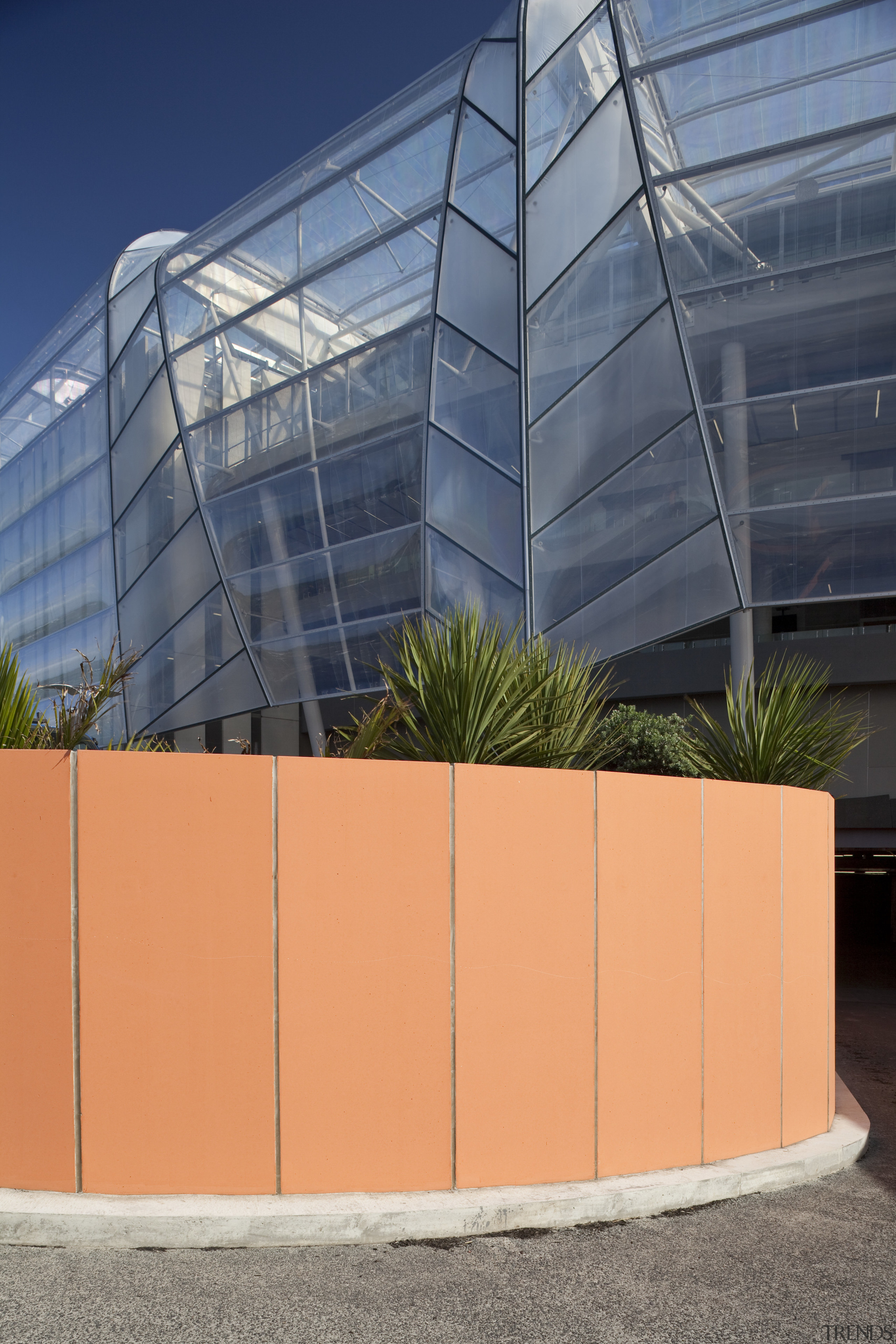 view of Eden Park which features precast concrete architecture, building, corporate headquarters, daylighting, facade, line, structure, orange