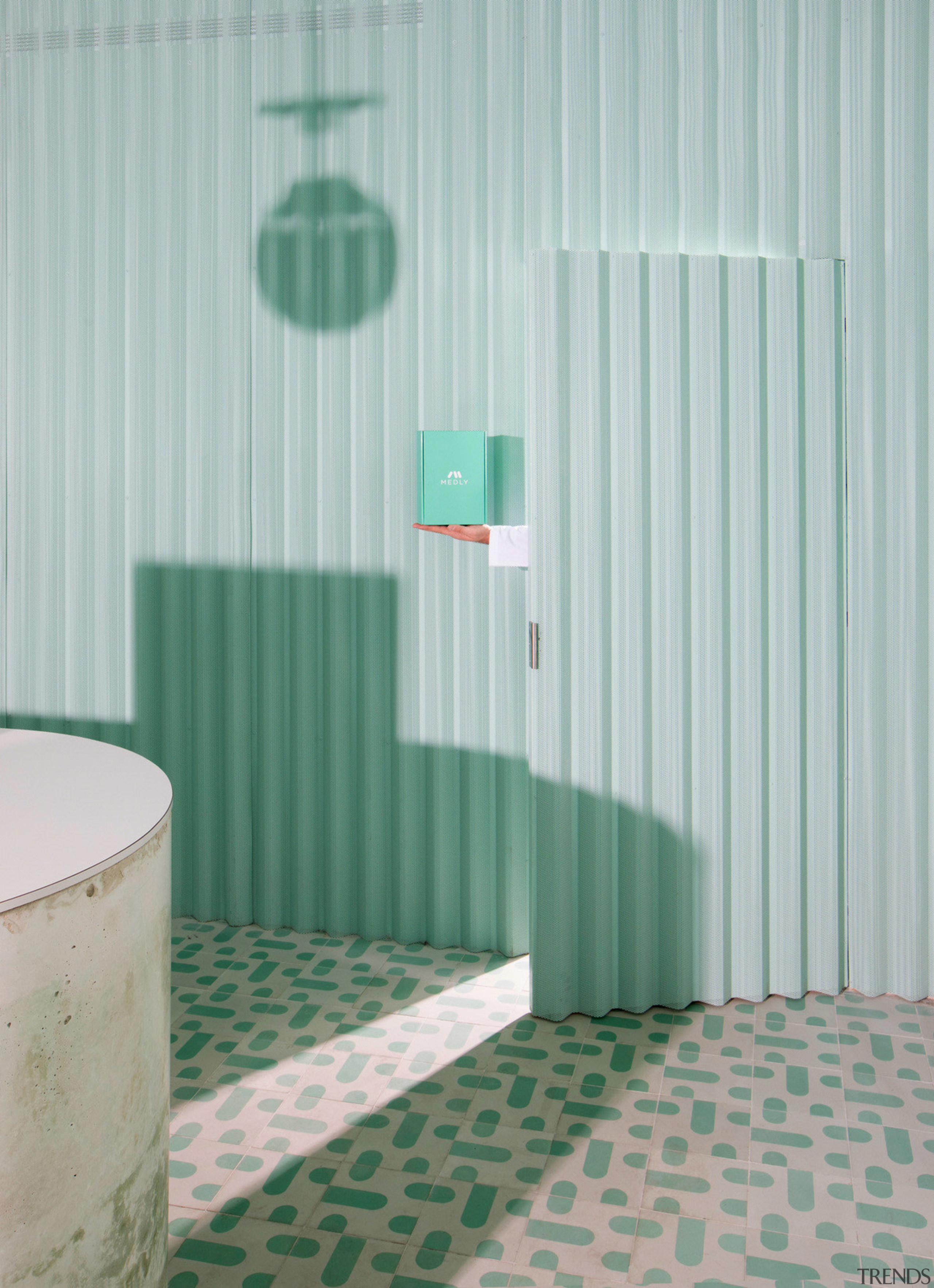 Sergio Mannino Studio designed this pharmacy to be architecture, floor, flooring, green, interior design, product, room, table, textile, wall, gray