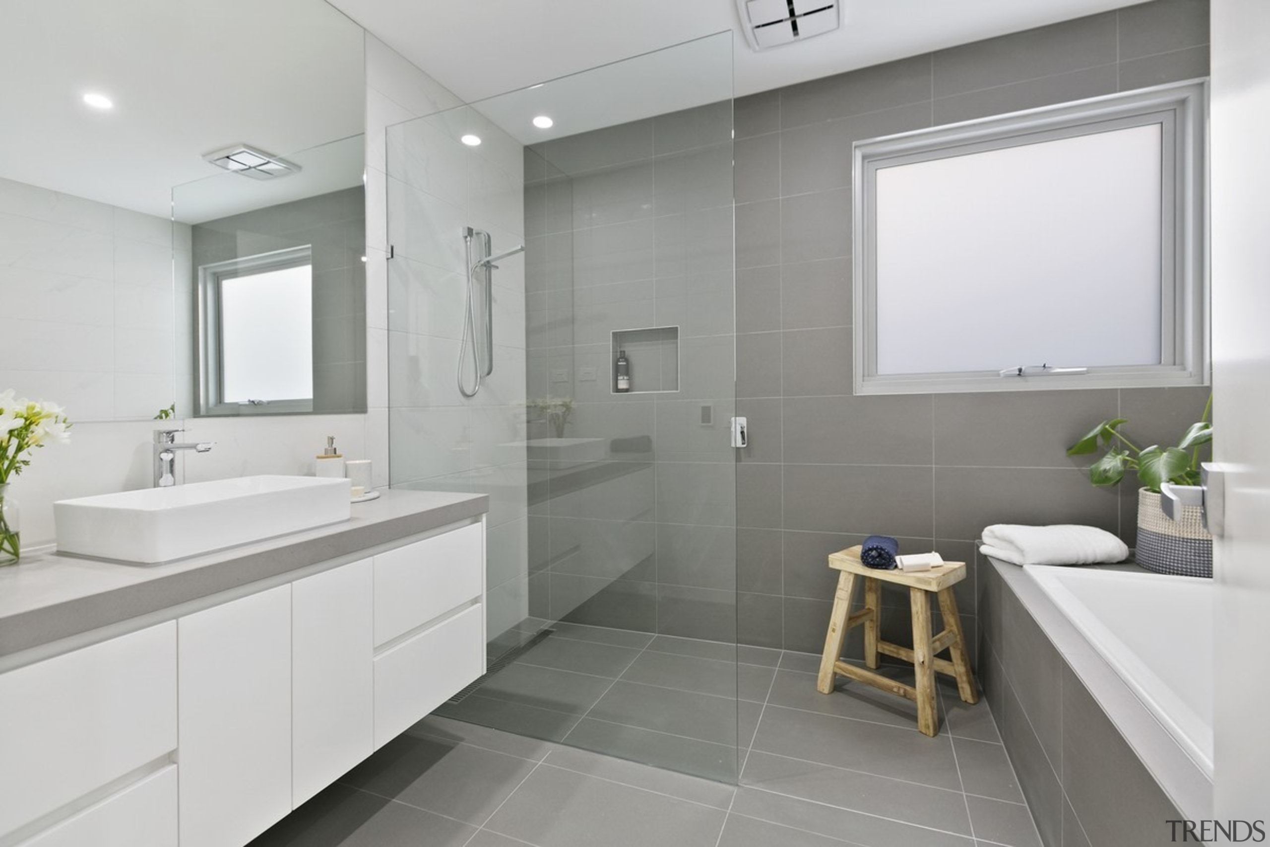 The shower links up to the rest of bathroom, bathroom accessory, floor, home, interior design, real estate, room, sink, gray