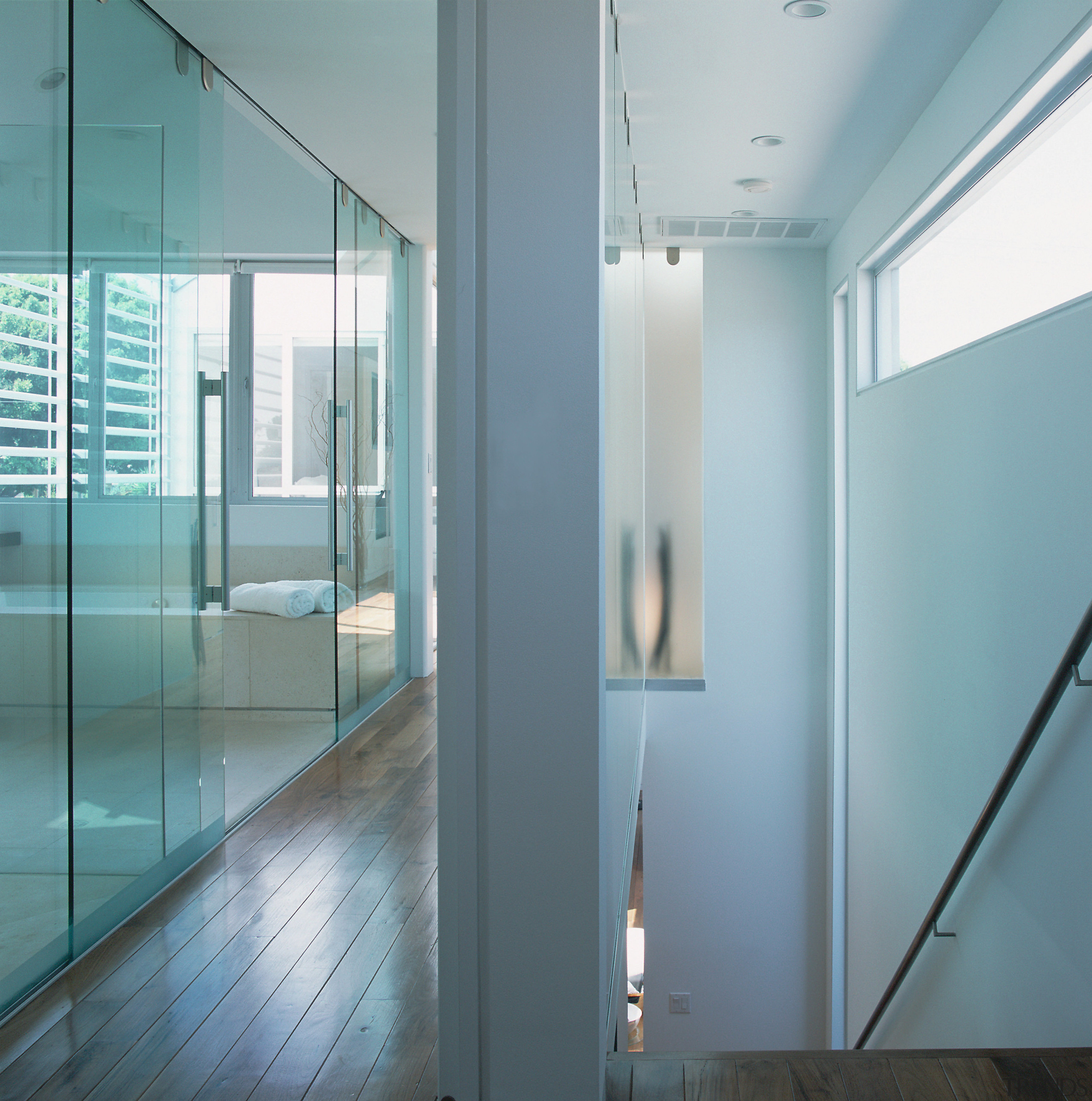 A view of the staircase and hallway featurin architecture, ceiling, daylighting, glass, house, interior design, wall, window, gray, teal