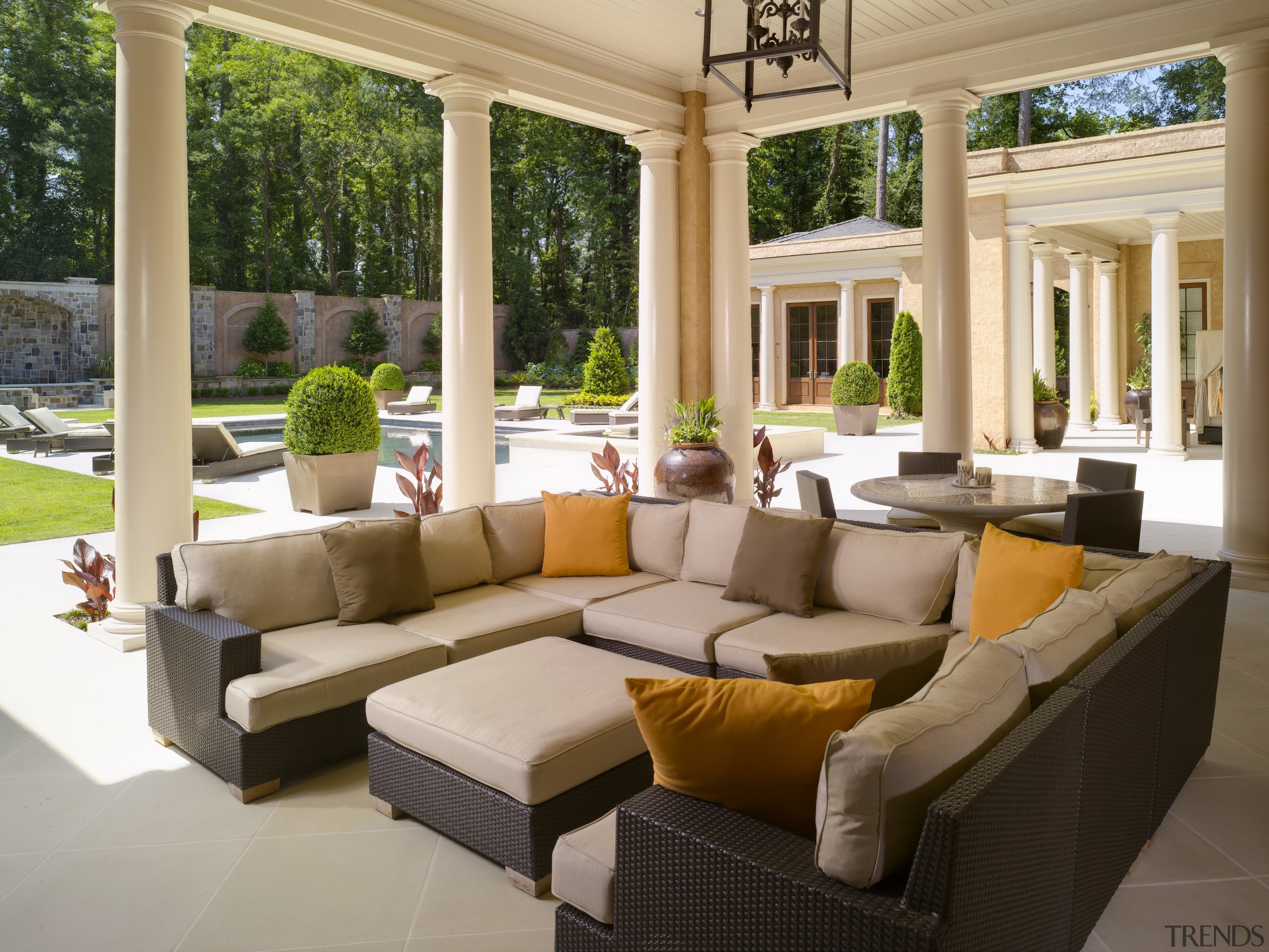 View of a living area in this Regency-styled estate, furniture, home, interior design, living room, outdoor structure, patio, property, real estate, window, brown, gray