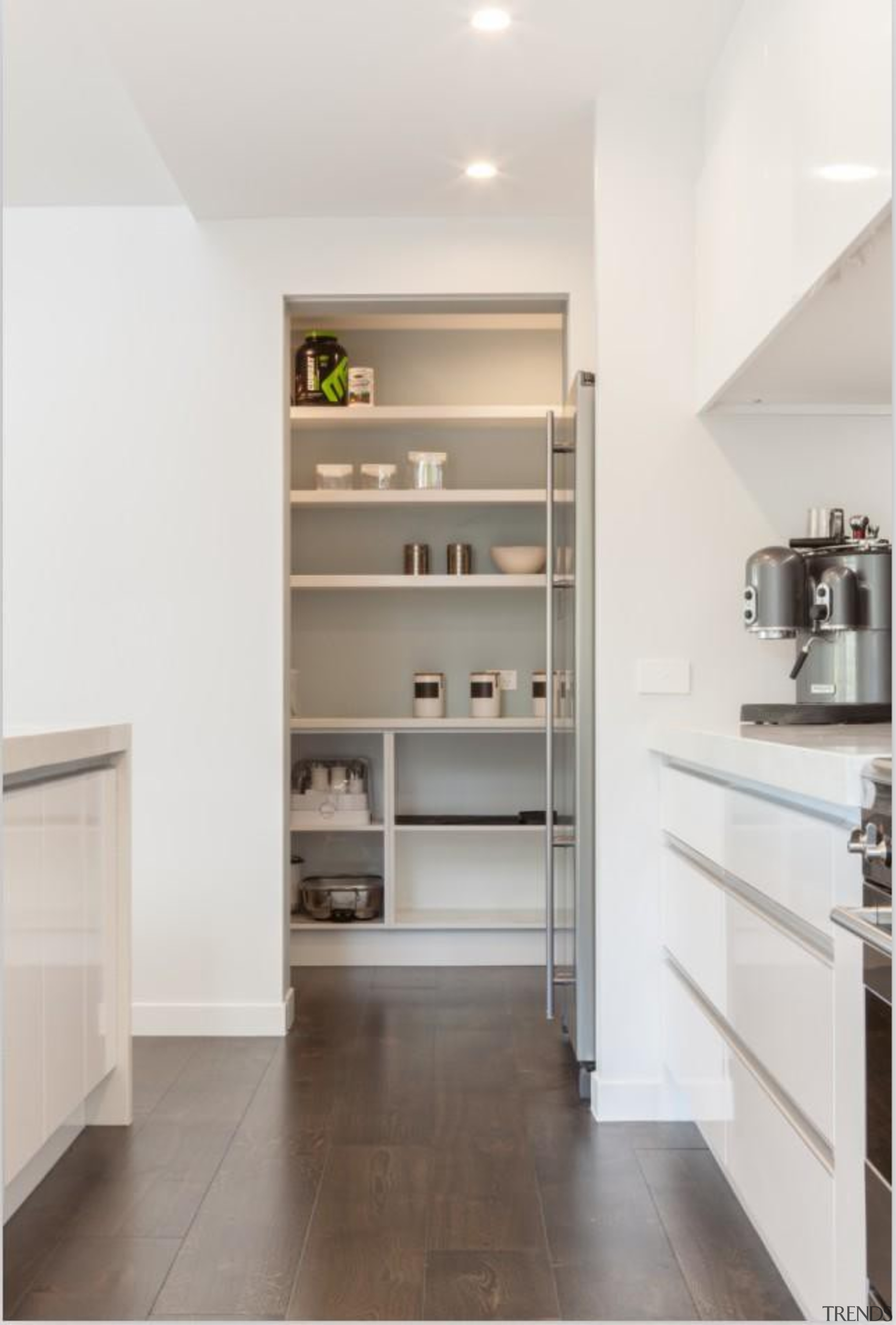 This new kitchen by Apollo Bathroom and Kitchen cabinetry, countertop, floor, flooring, home appliance, interior design, kitchen, major appliance, refrigerator, room, shelf, shelving, white, gray