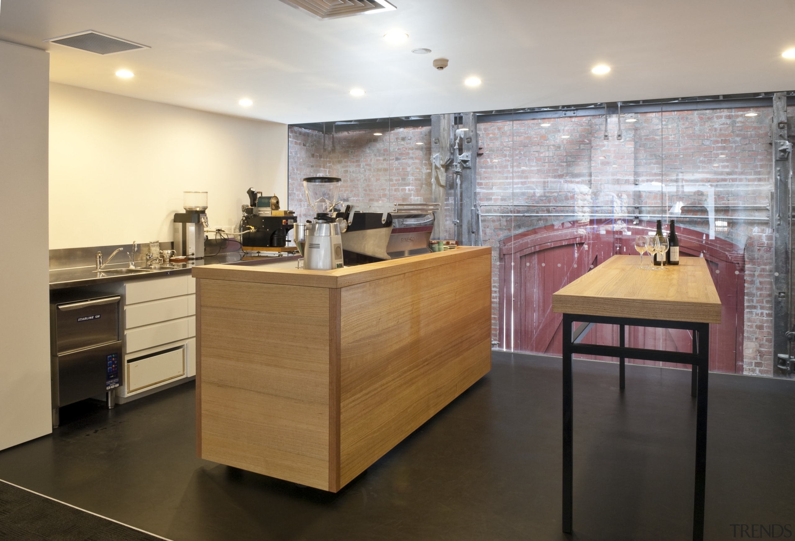 View of the new Mojo Coffee Holdings headquarters cabinetry, countertop, floor, flooring, interior design, kitchen, gray, brown