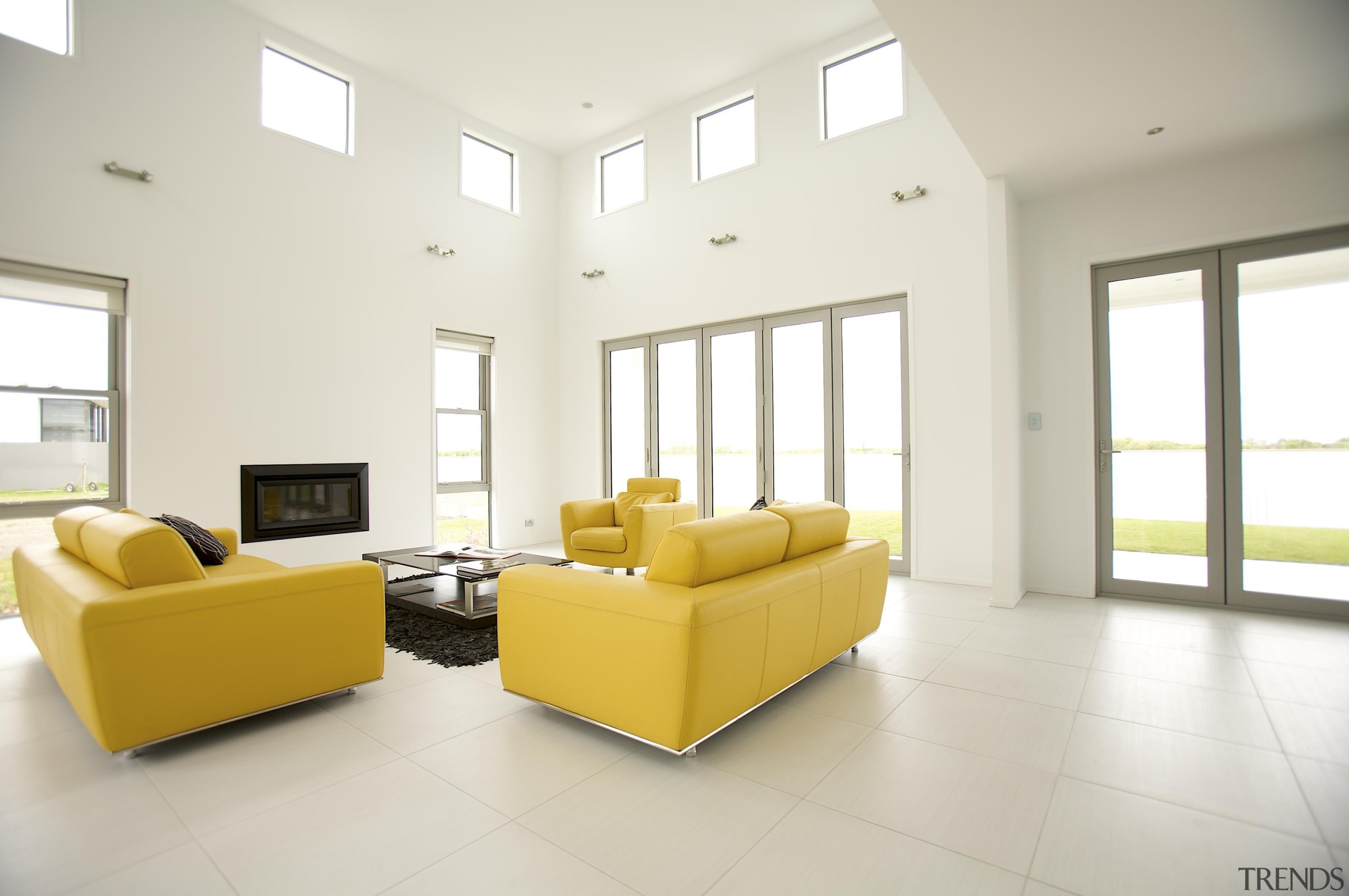 Living area Lake HoodFor more information, please visit ceiling, daylighting, estate, floor, flooring, home, interior design, living room, property, real estate, window, white