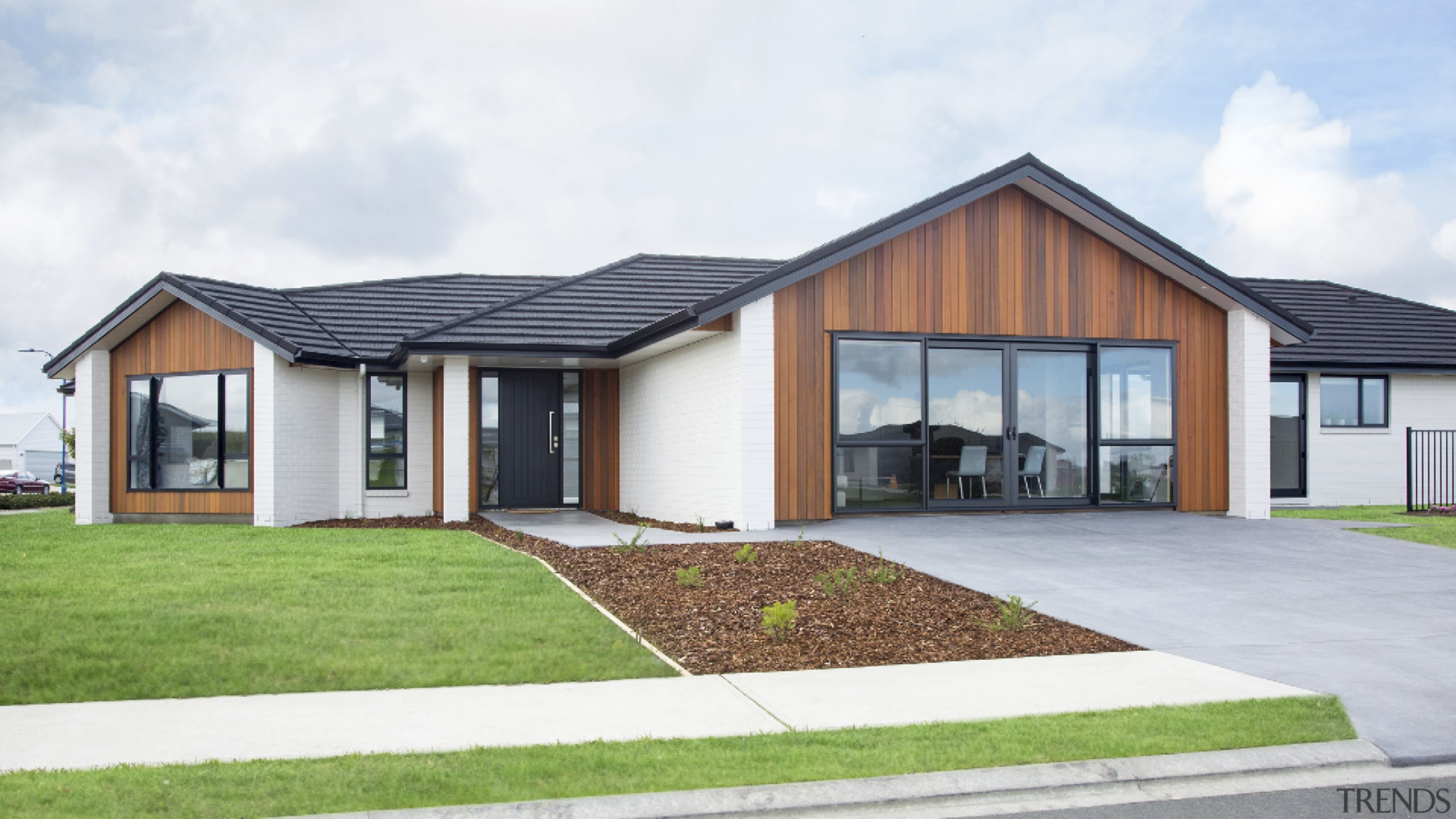 White-painted character brick and stained cedar make up 