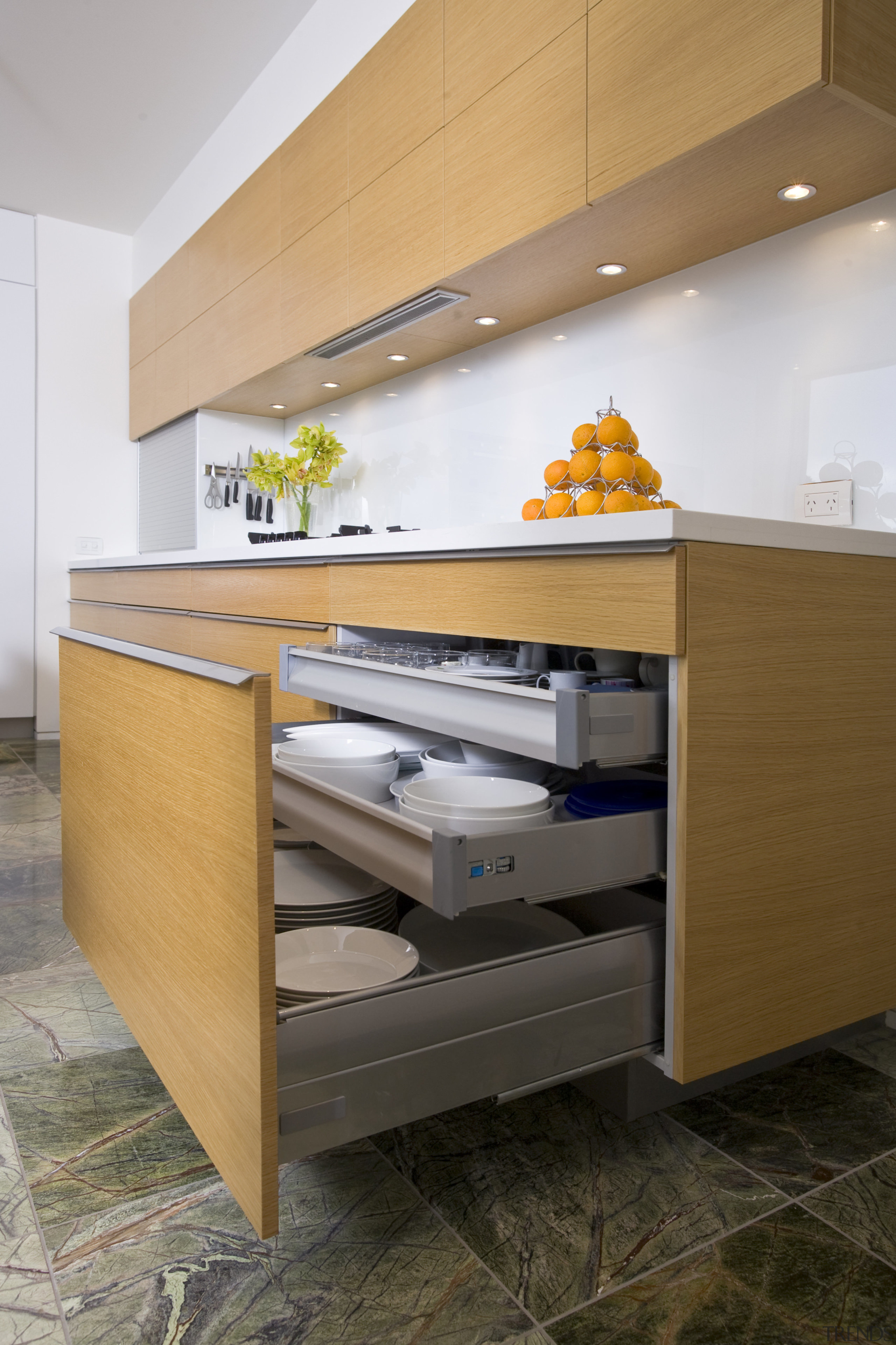 View of kitchen which features cabinetry designed and cabinetry, chest of drawers, countertop, drawer, floor, furniture, interior design, kitchen, plywood, product, product design, table, wood