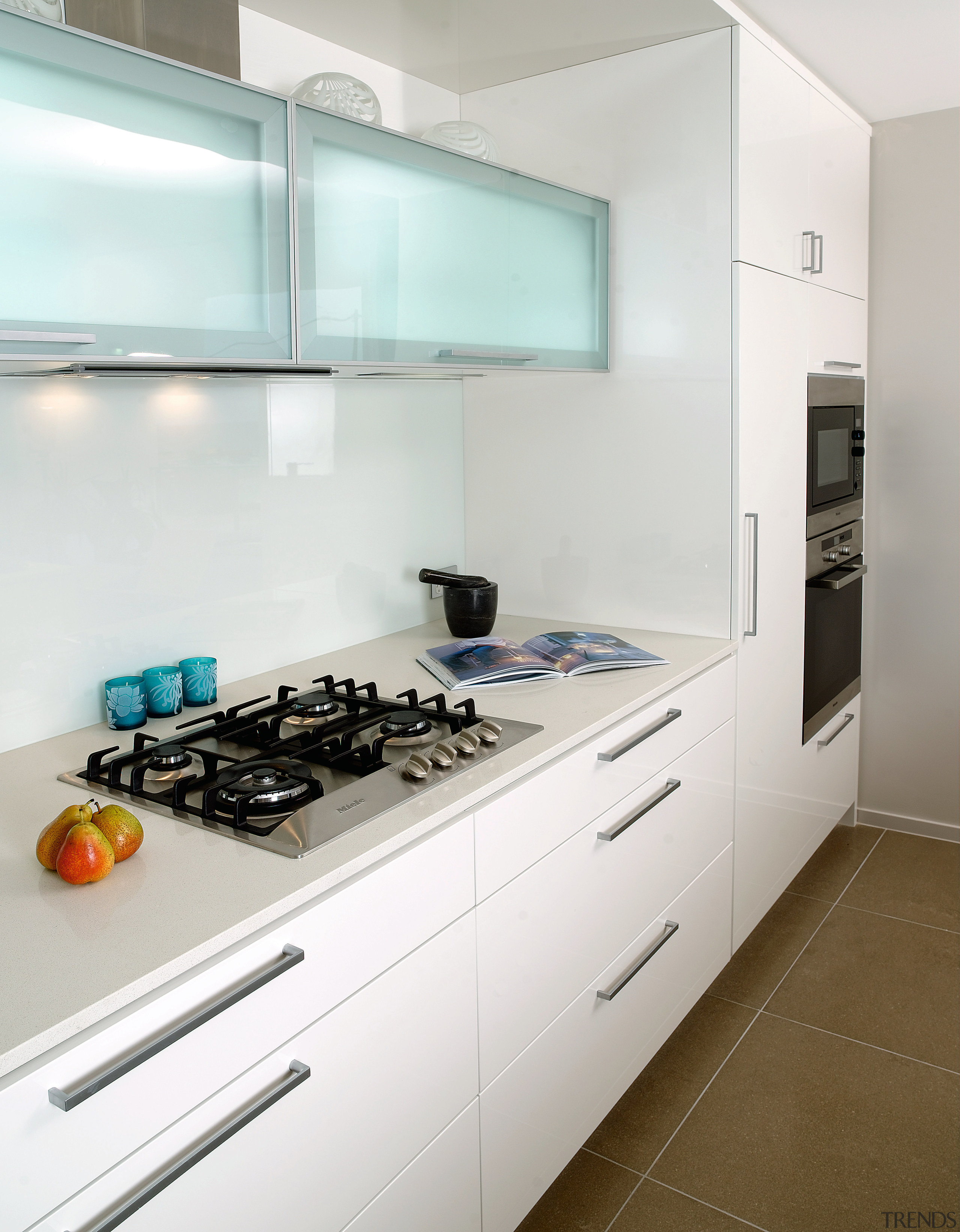 A view of a kitchen with some Miele cabinetry, countertop, home appliance, interior design, kitchen, room, white