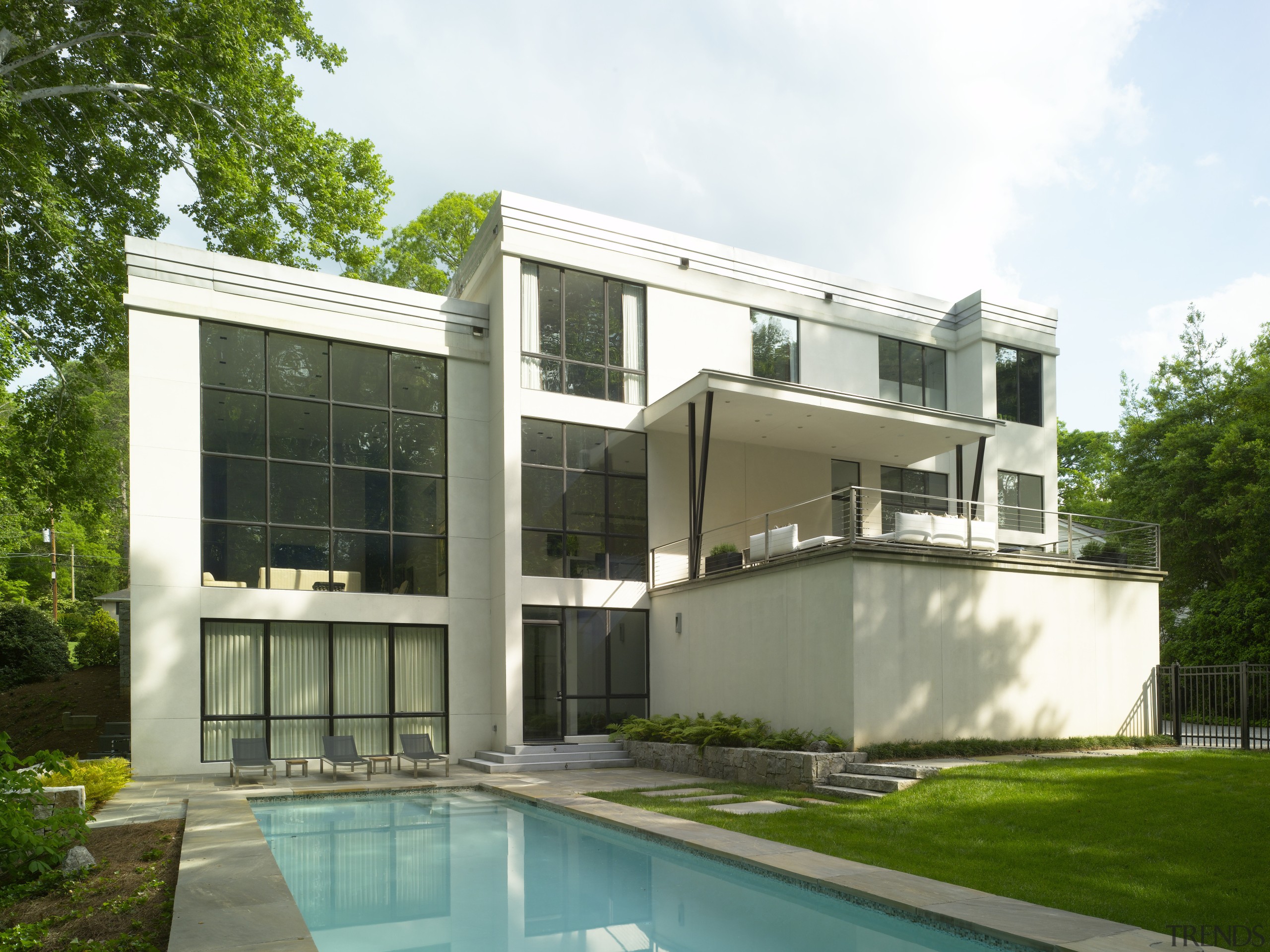 View of white home and pool. - View architecture, building, condominium, corporate headquarters, elevation, estate, facade, home, house, property, real estate, residential area, window, white, green